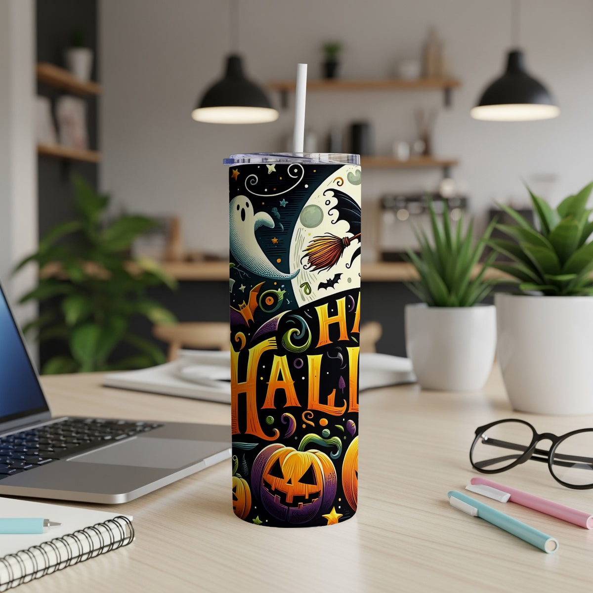 Tumbler with Halloween ghosts, pumpkins, broom, and bats.