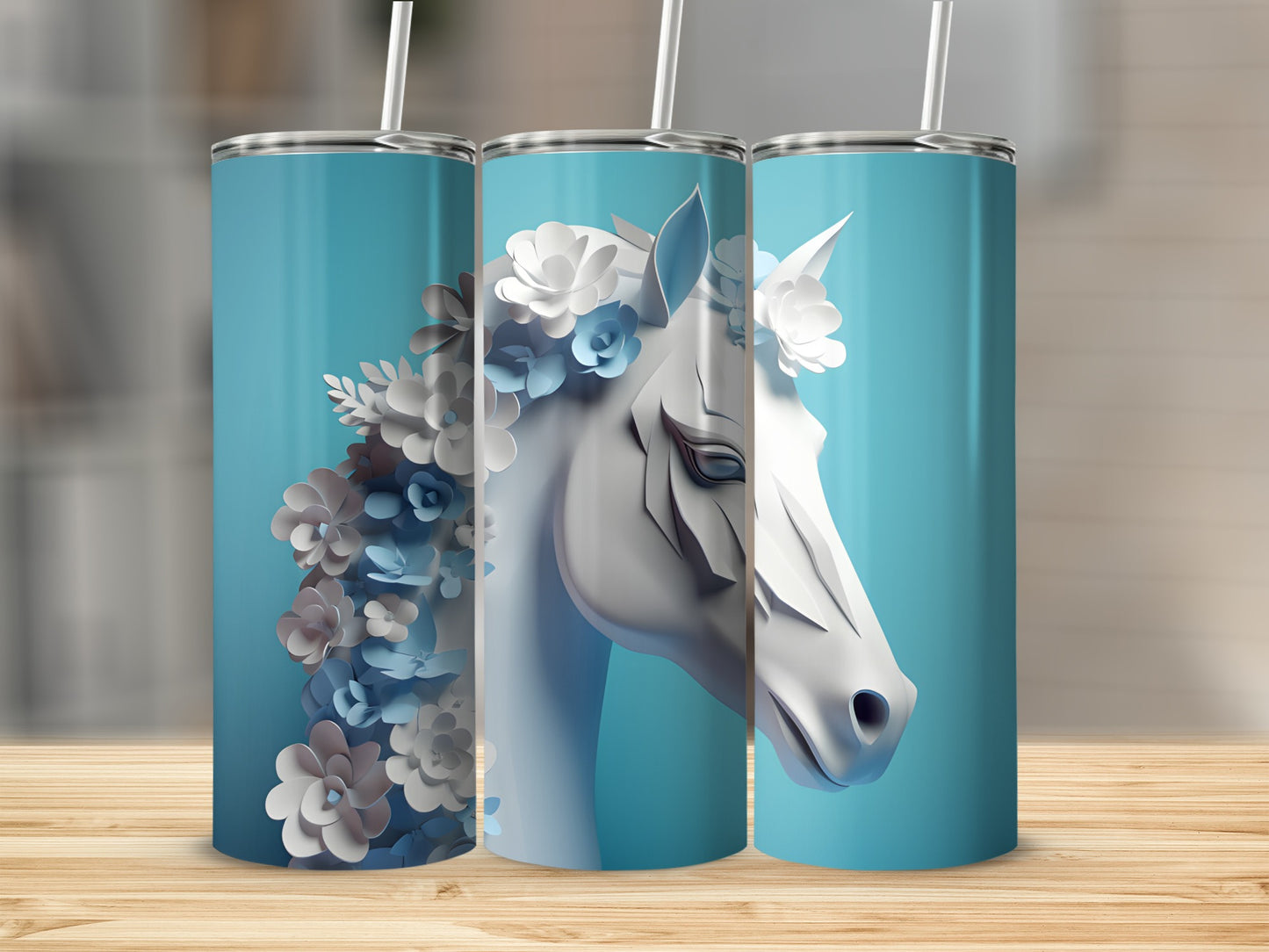 Three tall, light blue tumblers with a white horse head and floral design.