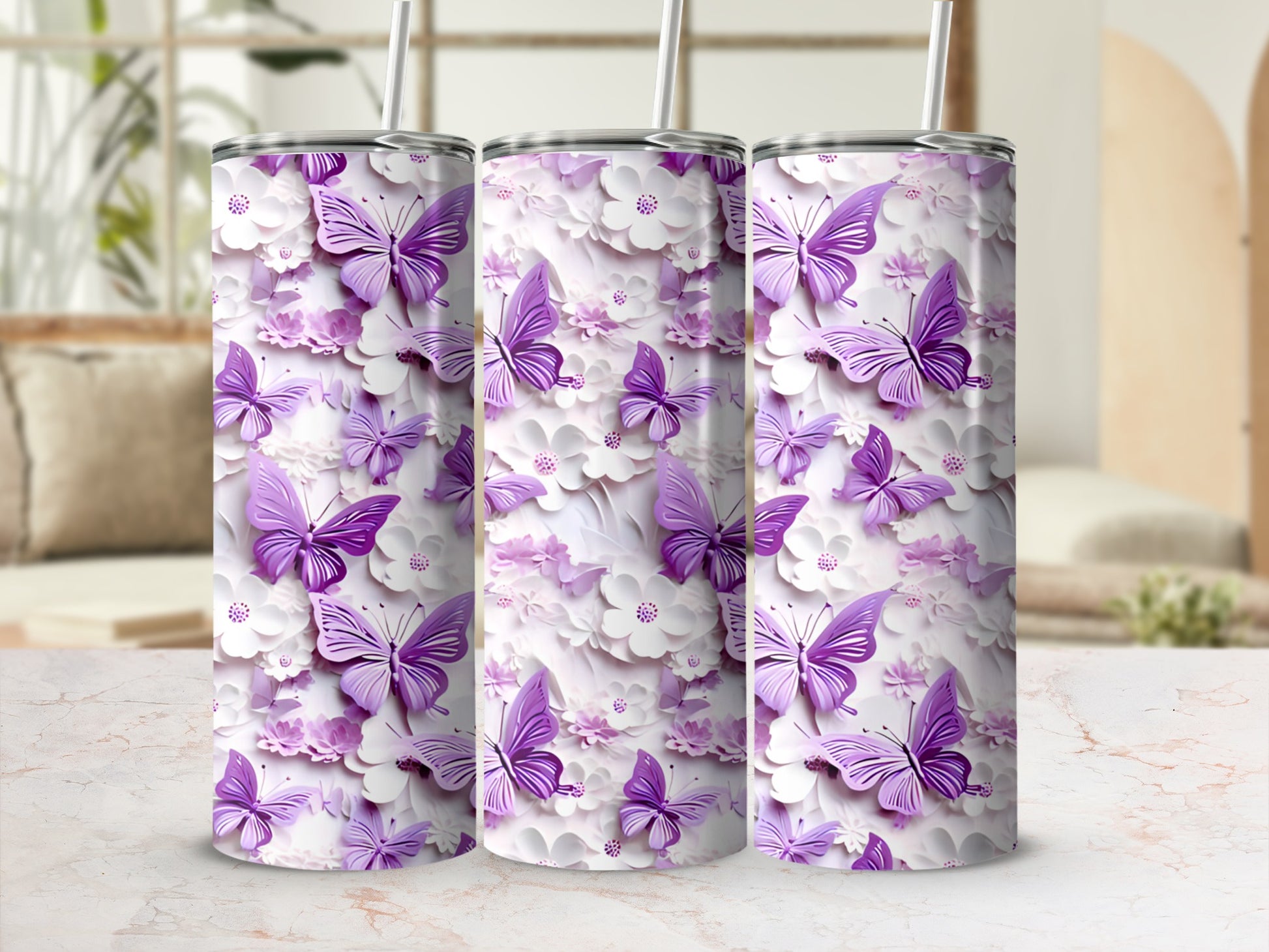Three tumblers with a purple butterfly and floral pattern.