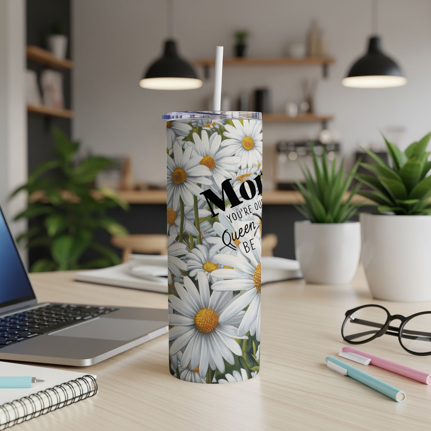 White daisy floral pattern tumbler with "Mom You're Our Queen" text.