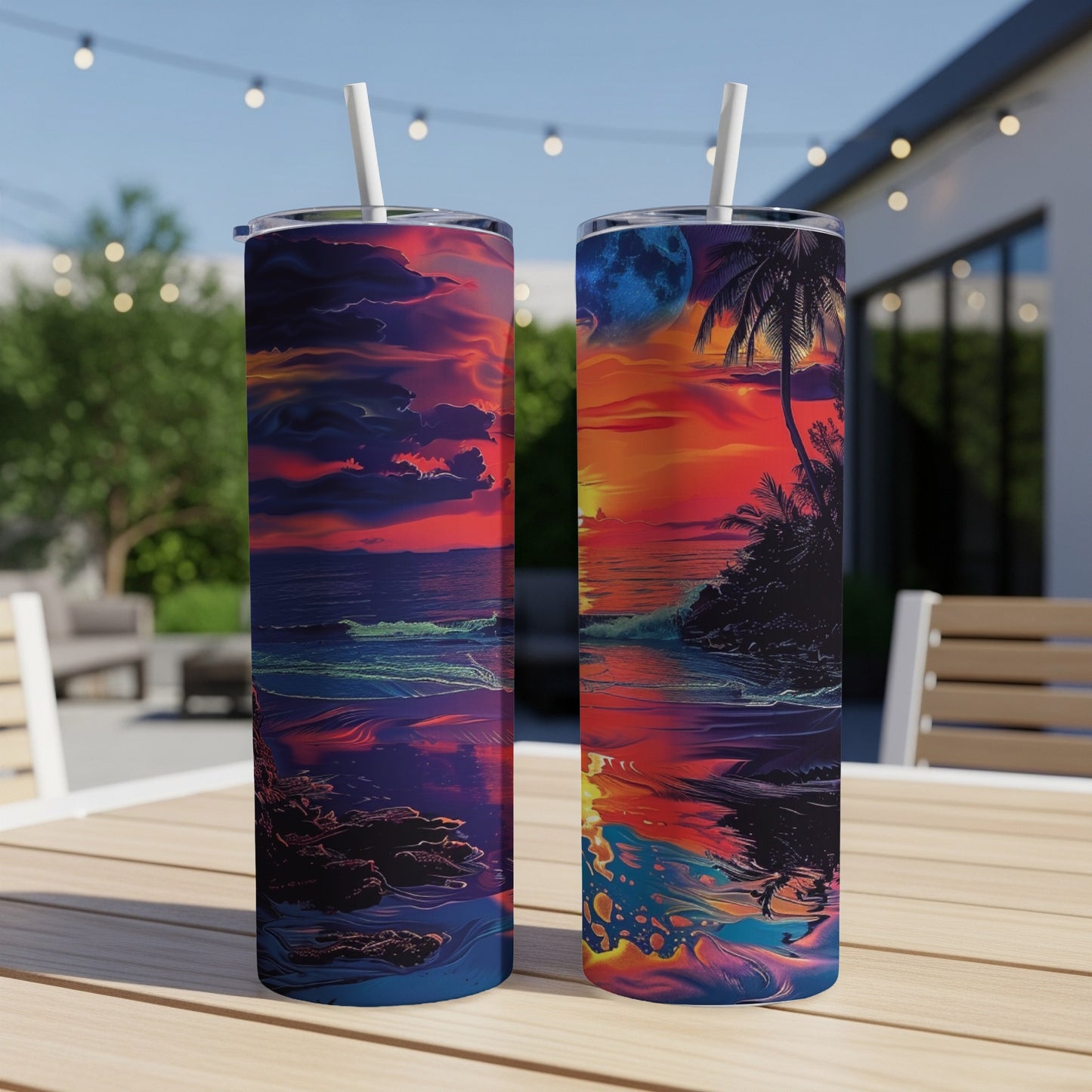 Two tumblers with a vibrant sunset beach scene and moon.
