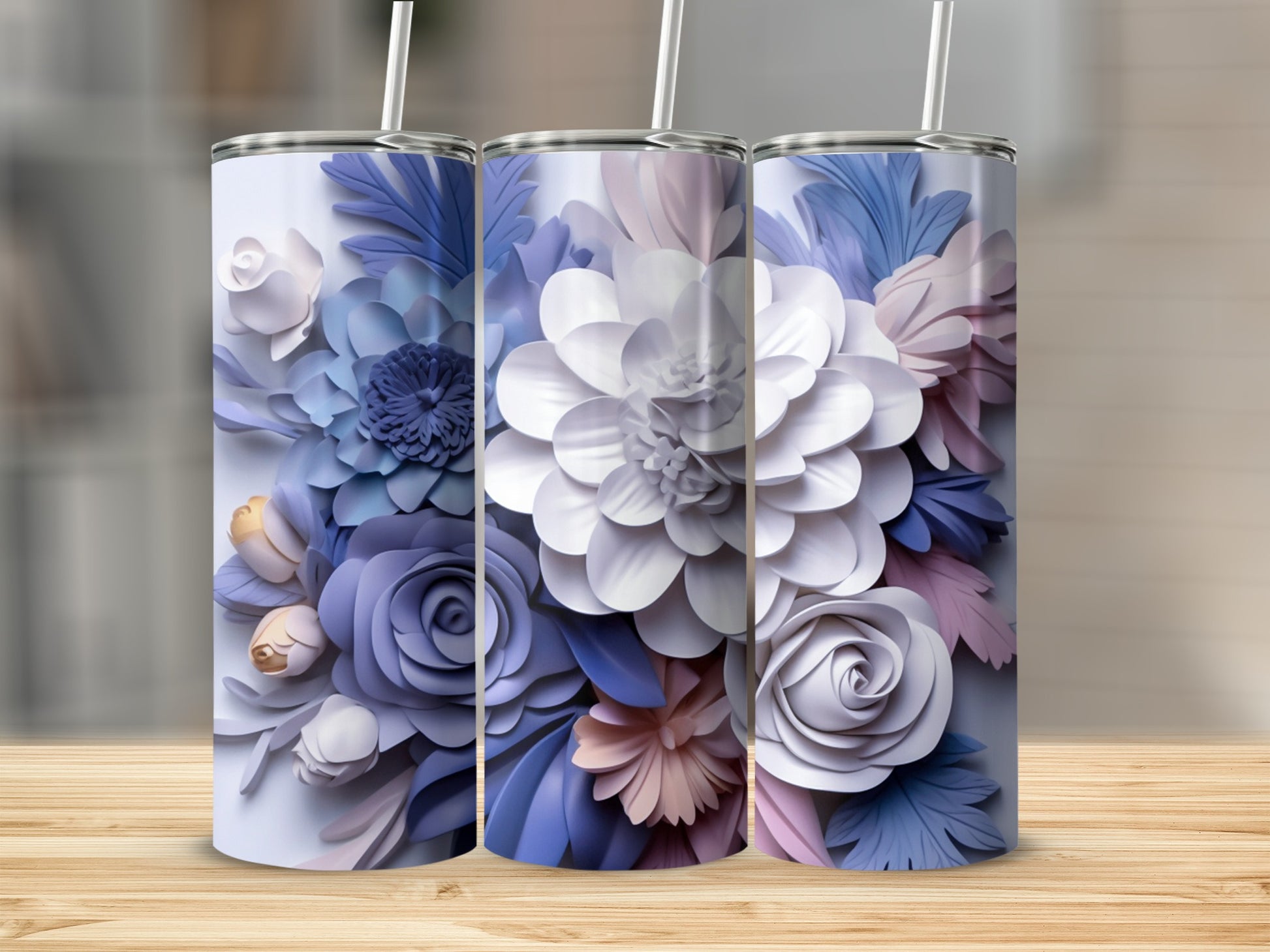 Three floral tumblers with white and lavender paper flowers and leaves.