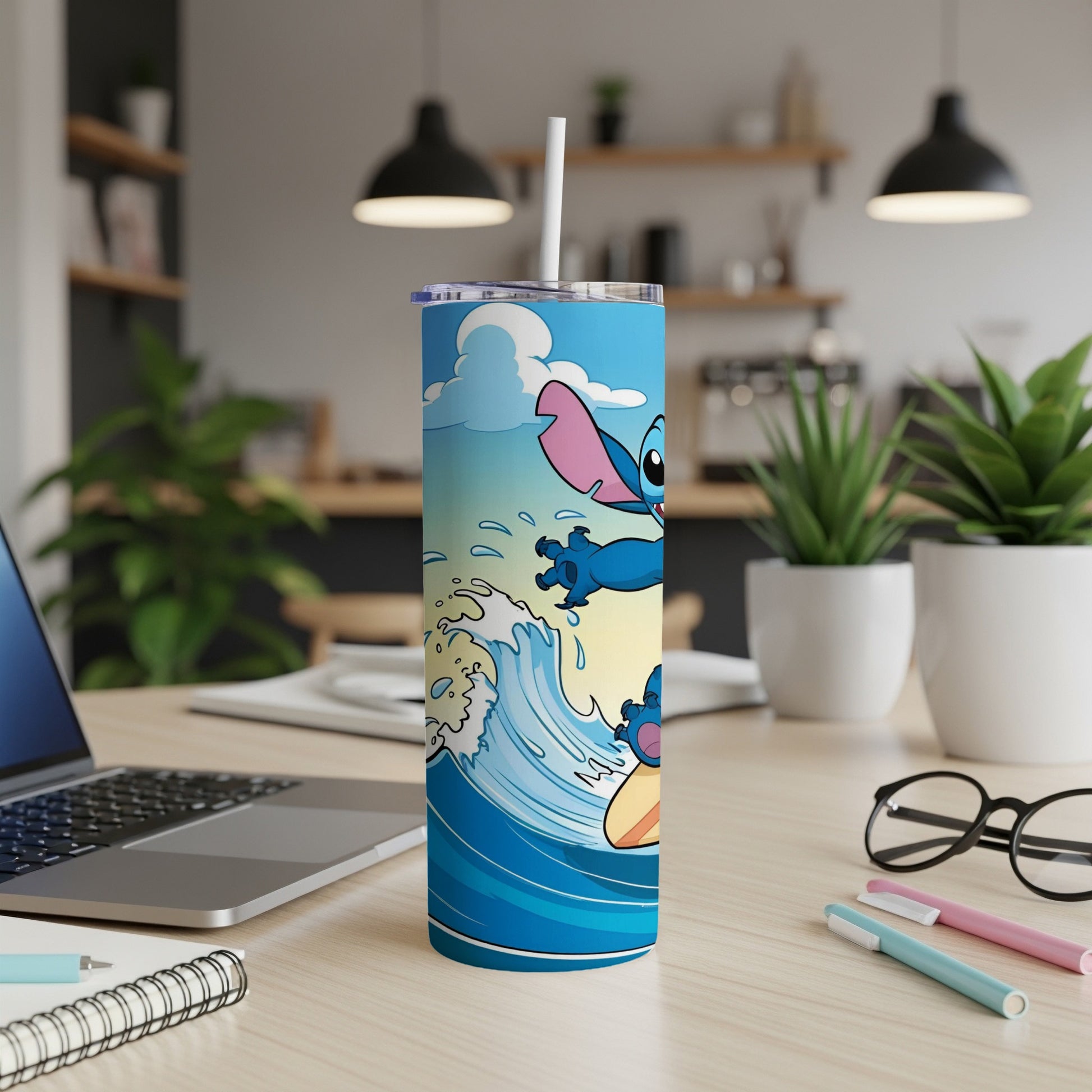Stitch from Lilo & Stitch surfing a wave on a blue tumbler.
