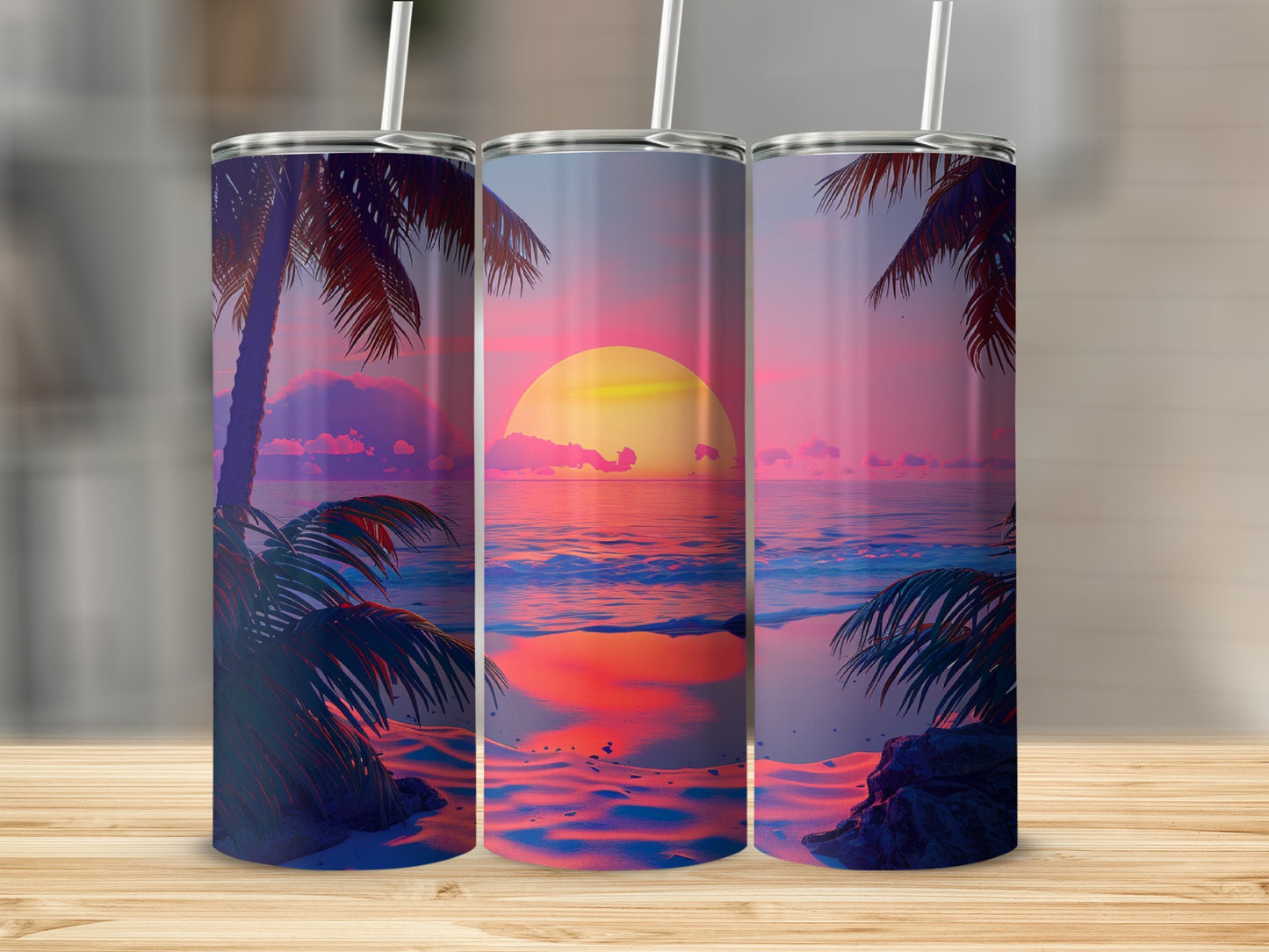 Three tumblers displaying a tropical beach sunset with palm trees.