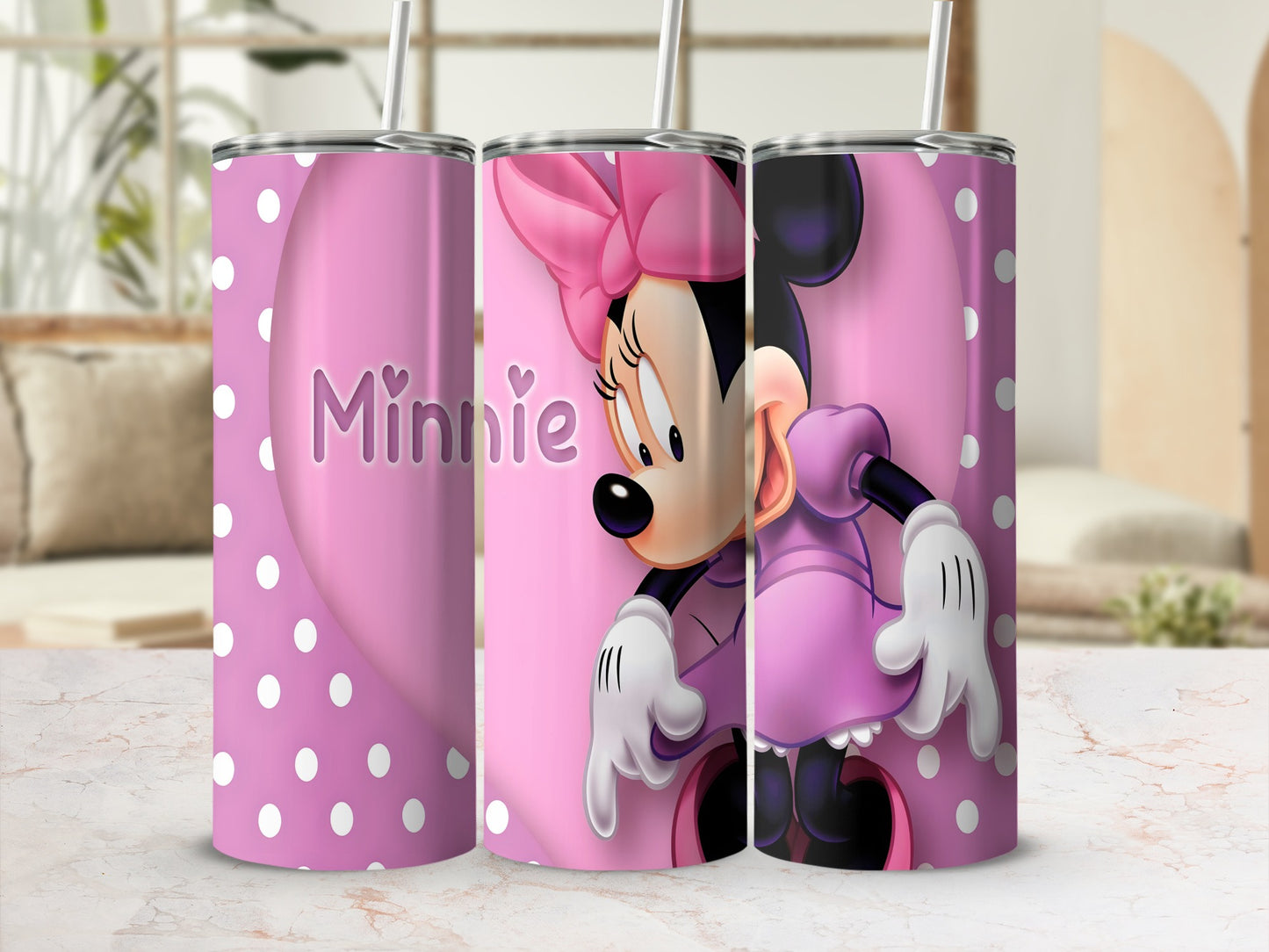 Pink tumbler with Minnie Mouse and polka dots.