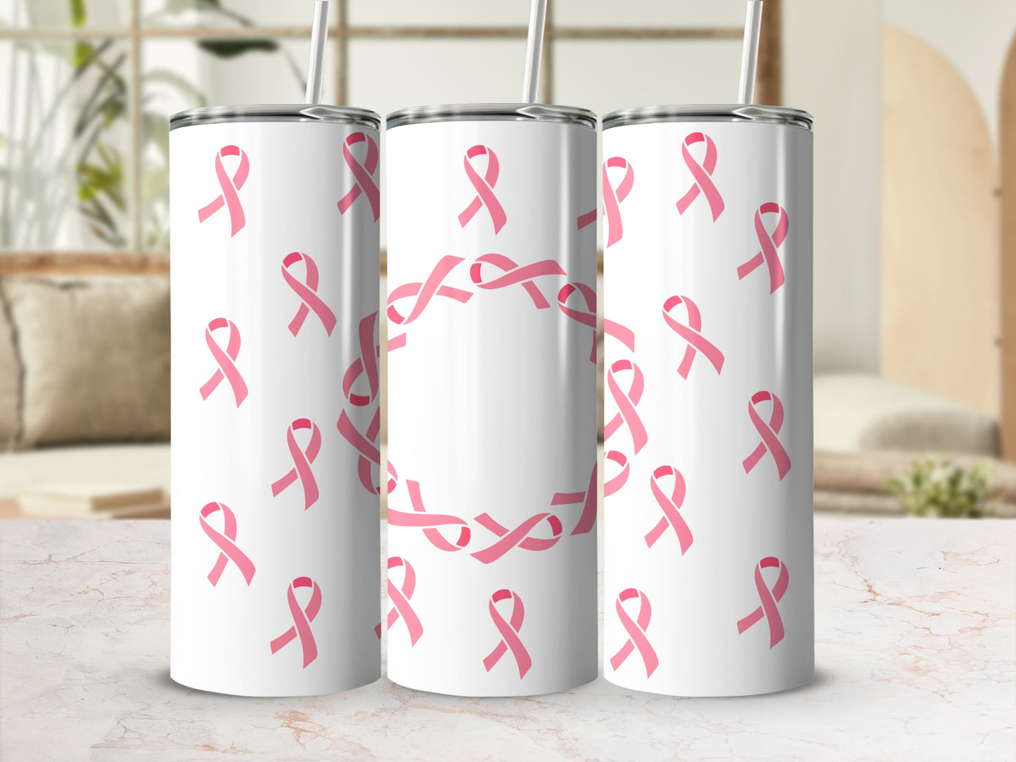 White tumbler with repeating pink ribbon pattern and a central ribbon wreath.