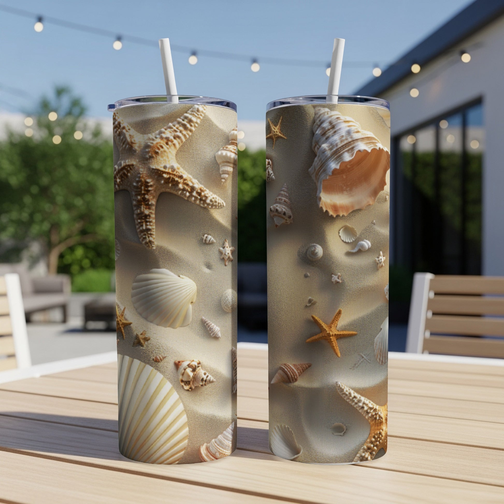 Two tumblers with a beach scene featuring seashells and starfish.