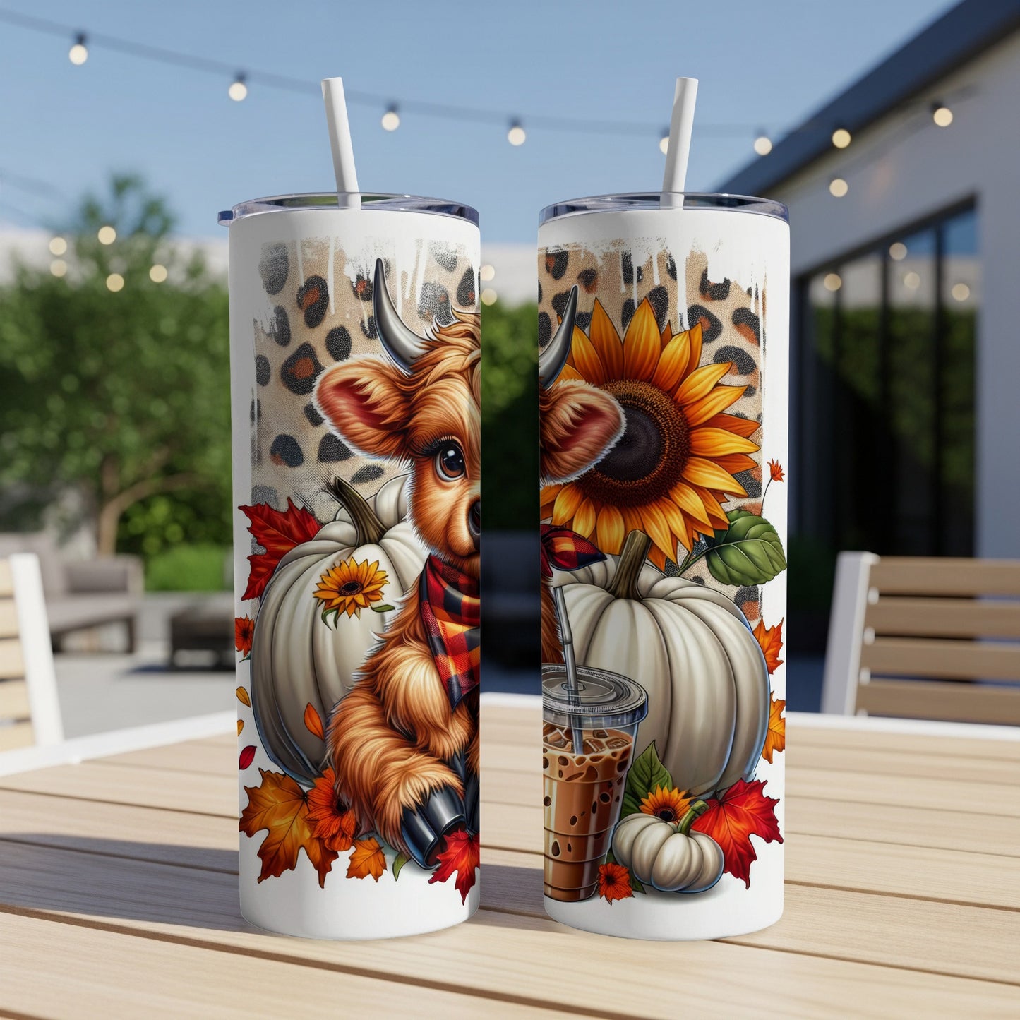 Two tumblers with a cow, sunflower, pumpkins, and leopard print design.