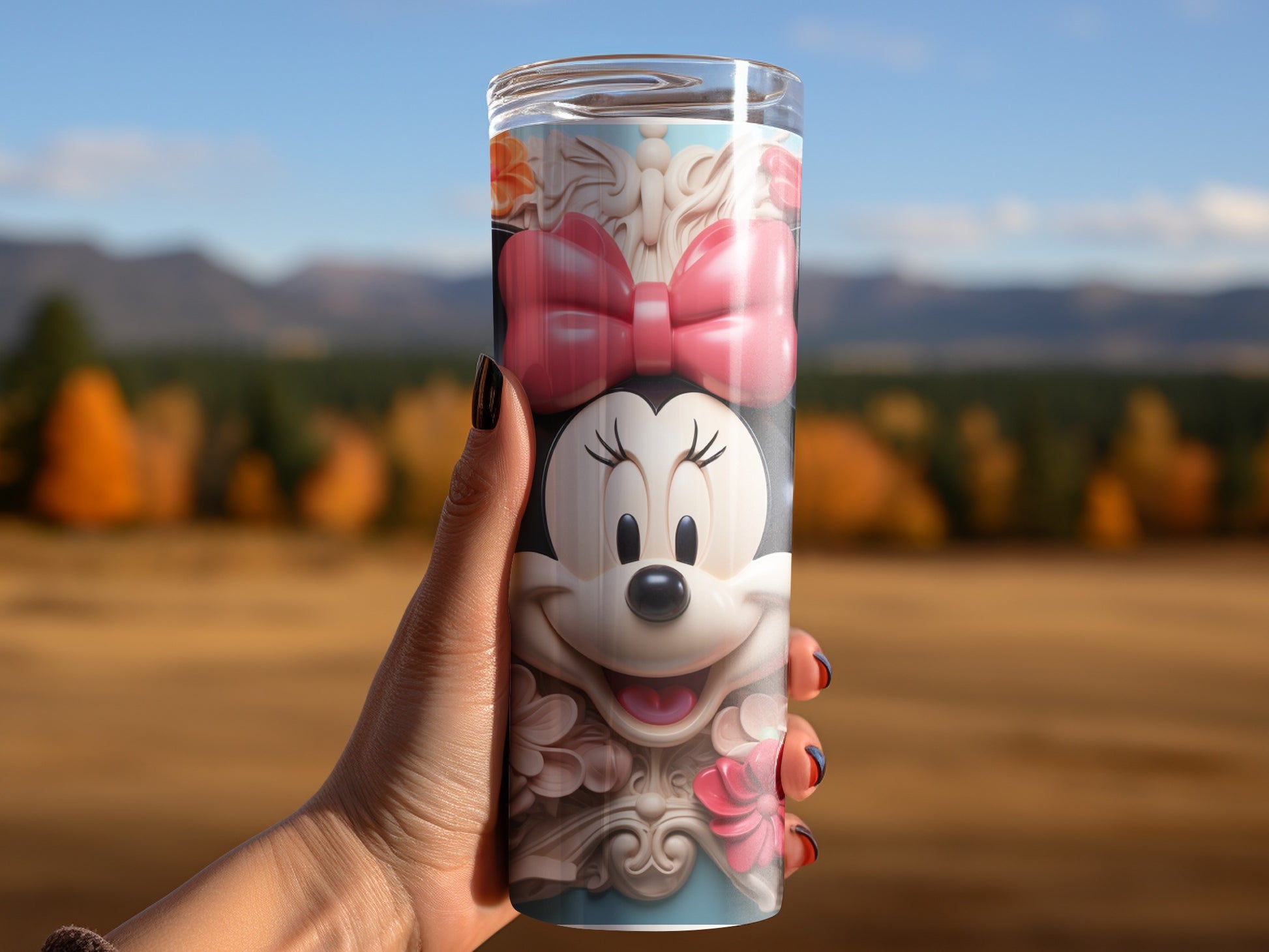 Minnie Mouse themed tumbler with vibrant scenic backdrop
