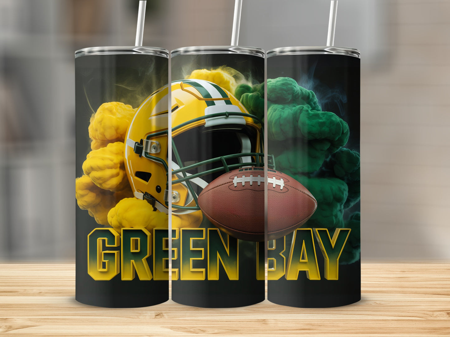 Green Bay Packers football helmet, ball, and team name on three tumblers.