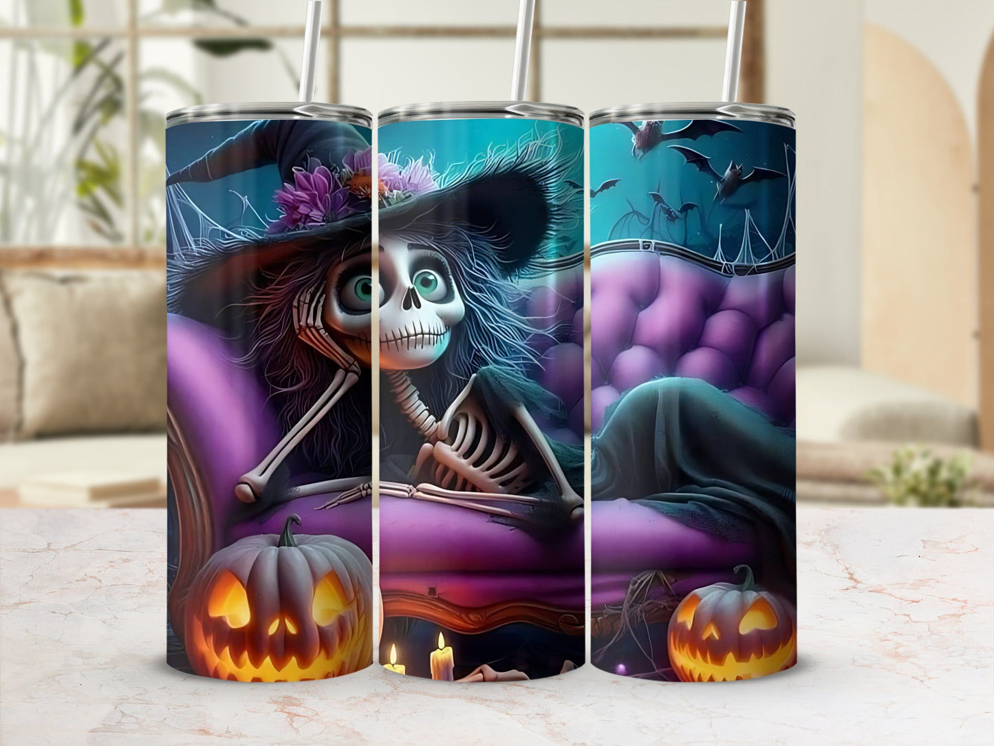 Halloween tumblers with a skeleton witch, bats, and jack-o'-lanterns.