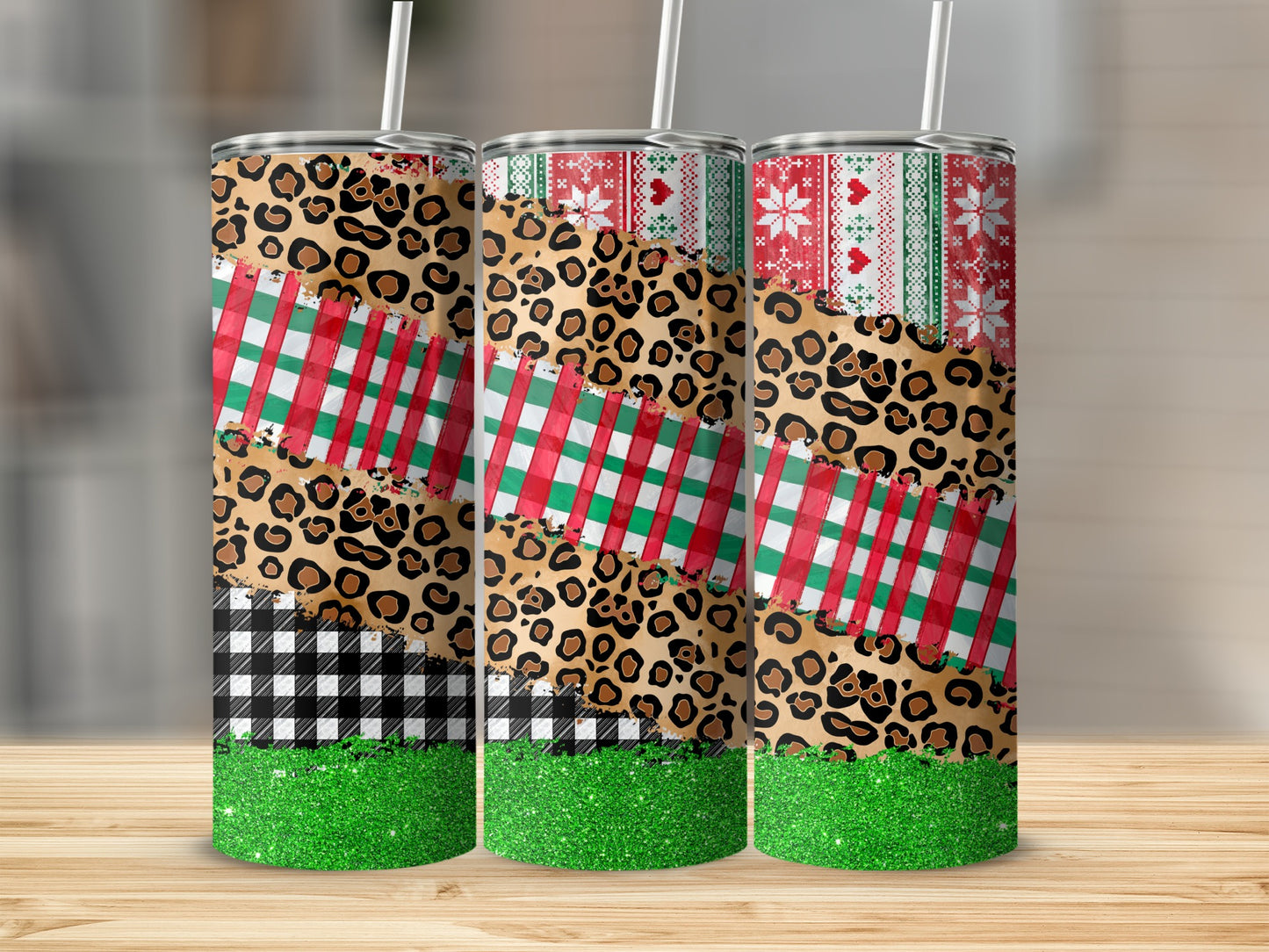 Three tumblers with leopard print, buffalo check, plaid, and holiday patterns.