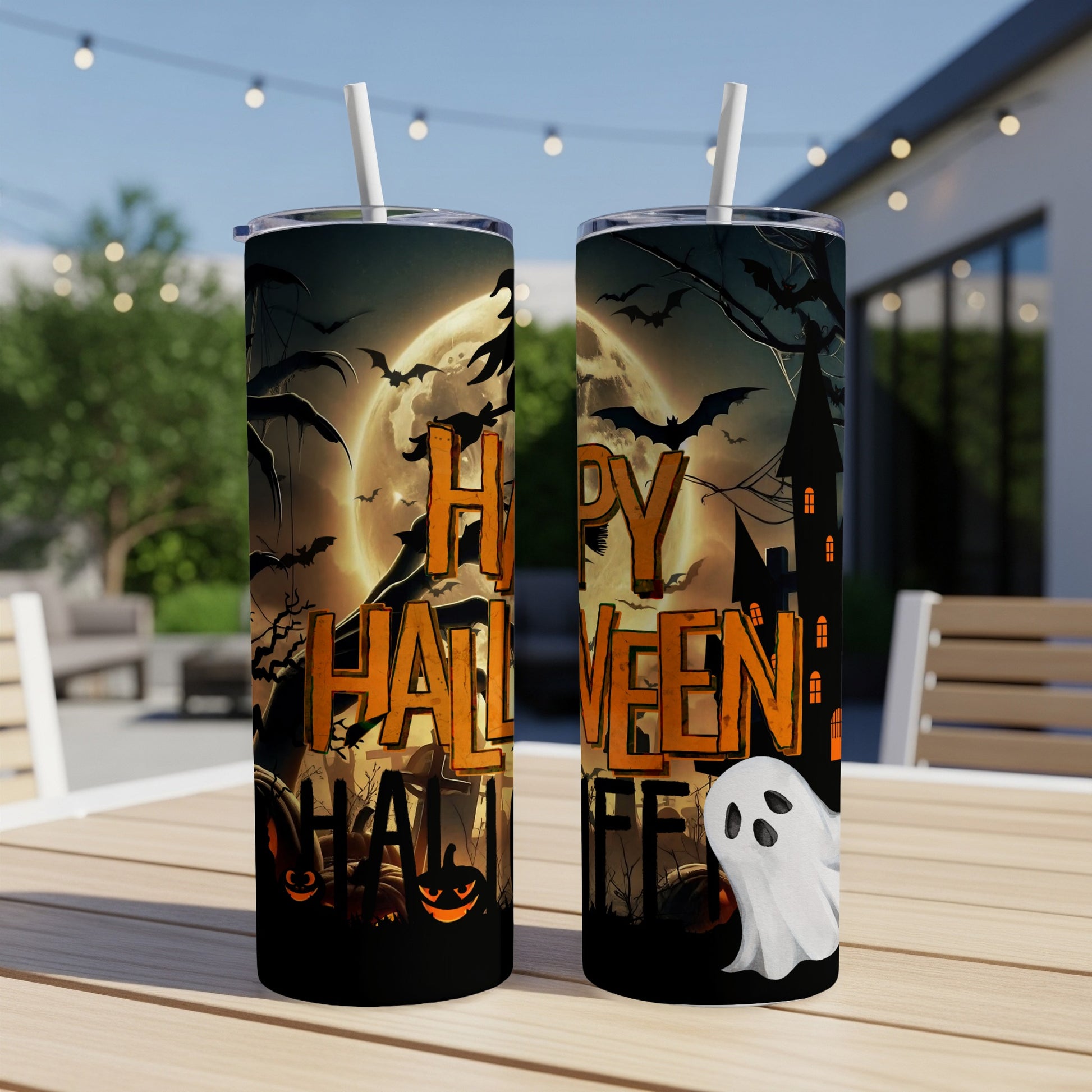 Halloween tumbler with spooky graveyard, bats, and ghost.
