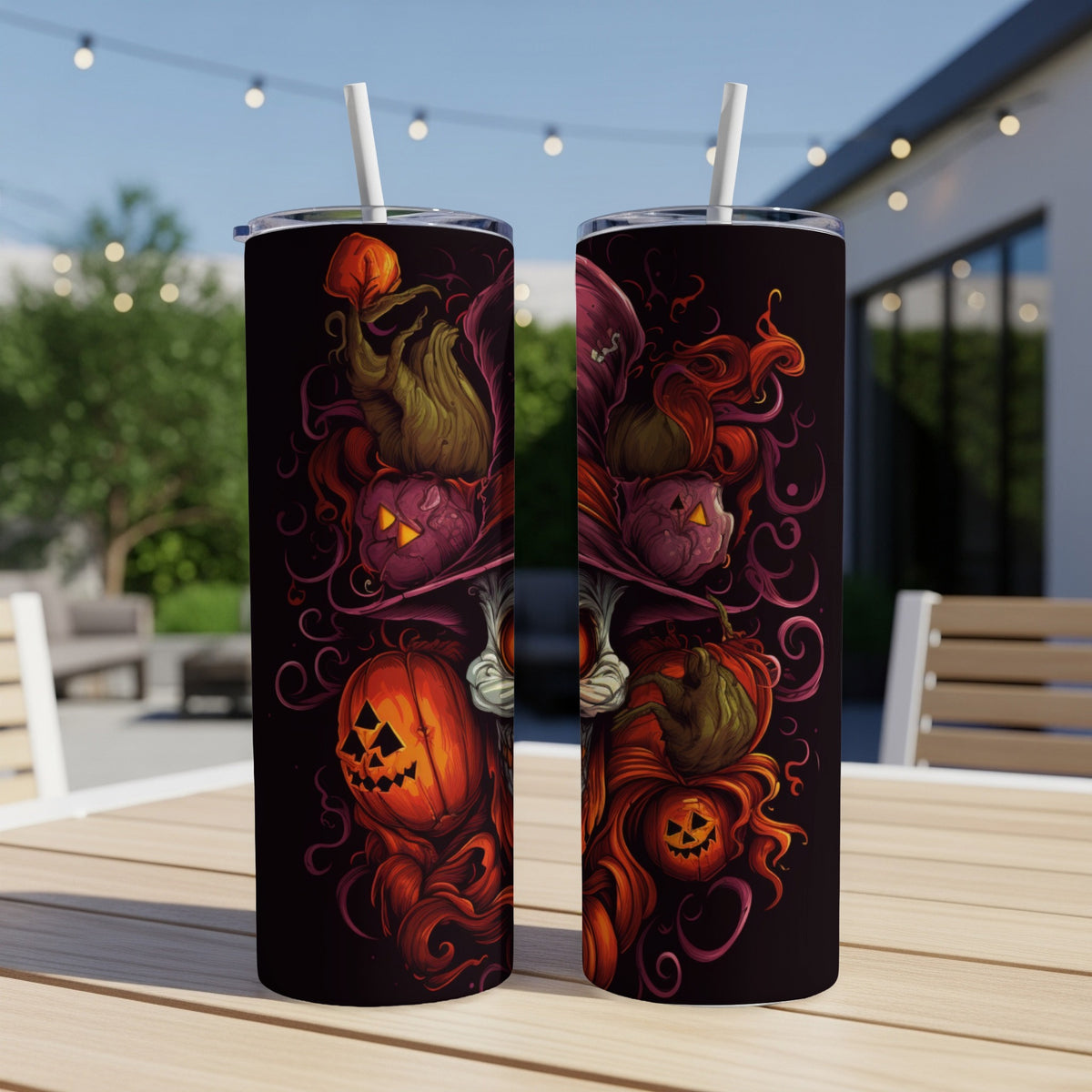 Two tumblers with a dark Halloween theme featuring pumpkins and swirling red and purple designs.