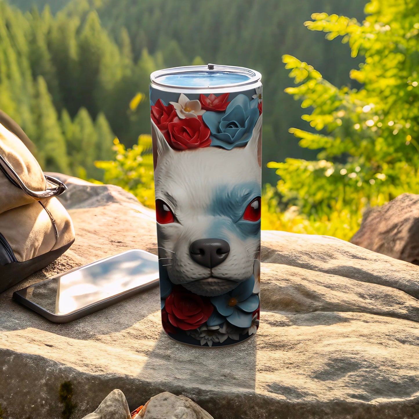White dog face with red eyes on a floral patterned tumbler.