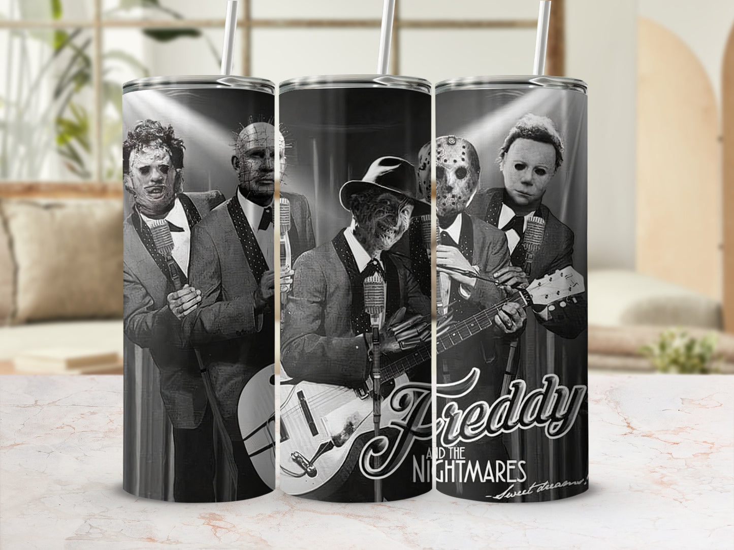 Horror villains "Freddy and the Nightmares" text on a black and white tumbler.