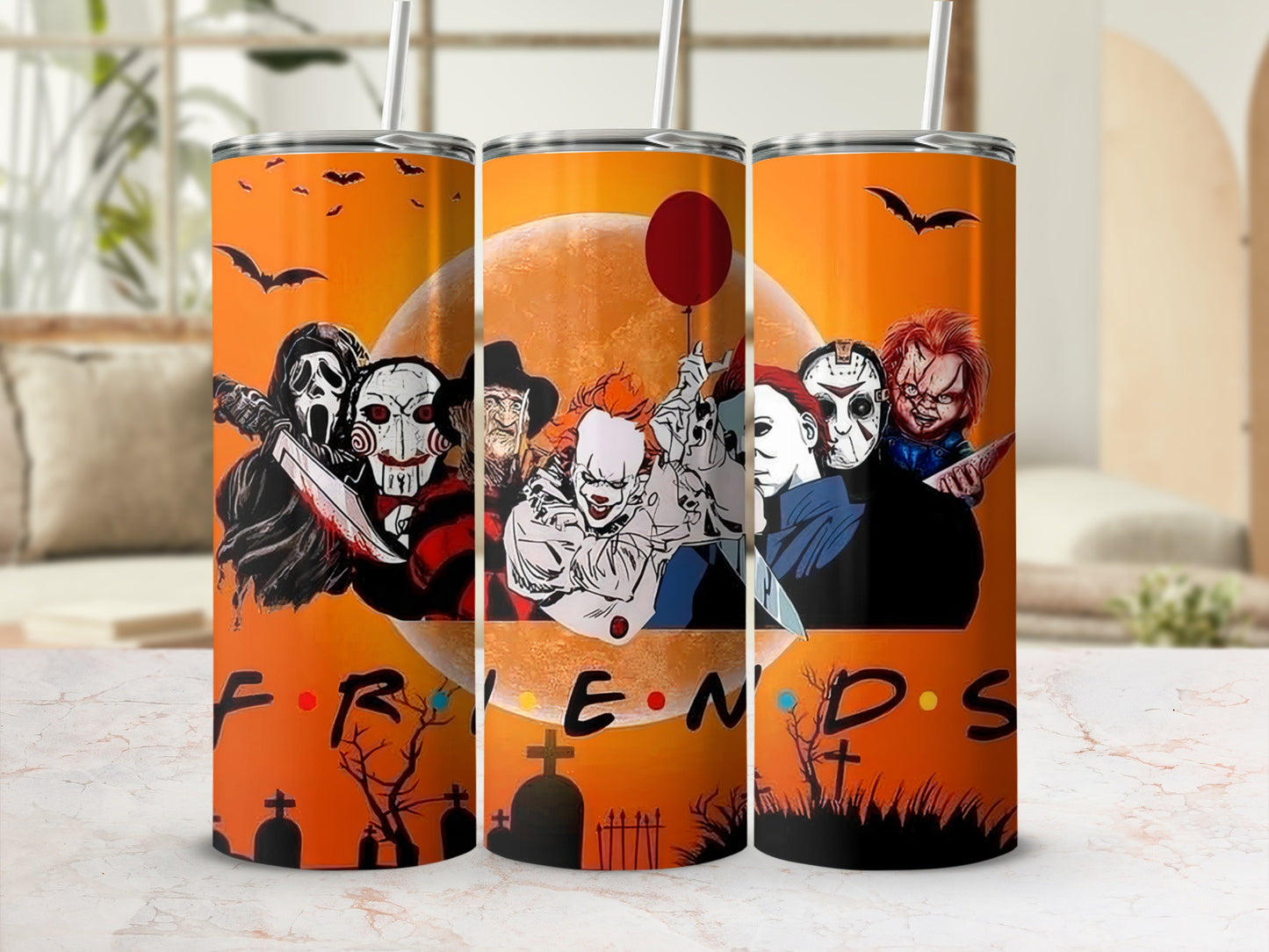 Horror characters and "Friends" logo on a Halloween-themed tumbler.