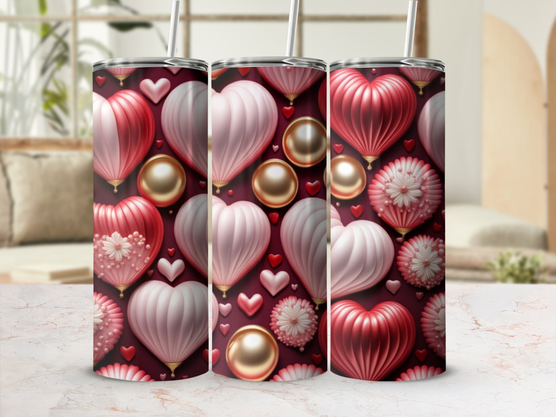 Pink and red heart pattern on a tumbler with golden beads and floral accents.