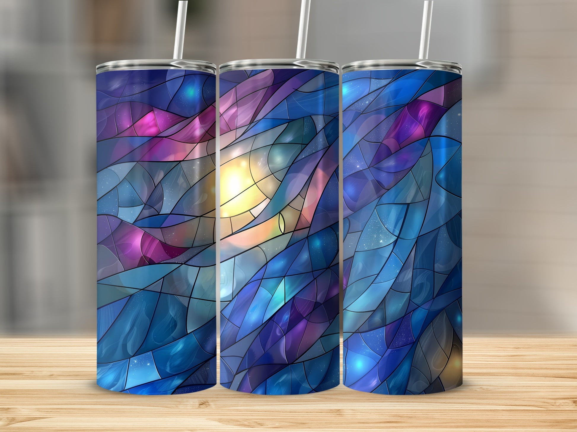 Three tumblers with a stained glass galaxy design.