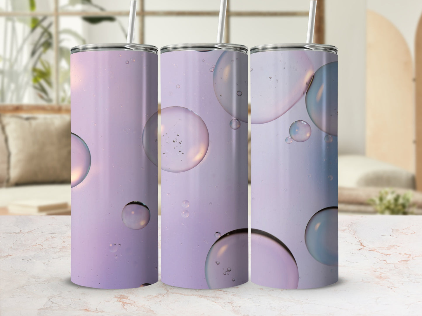 Three tumblers with a purple and pink gradient and floating bubbles.