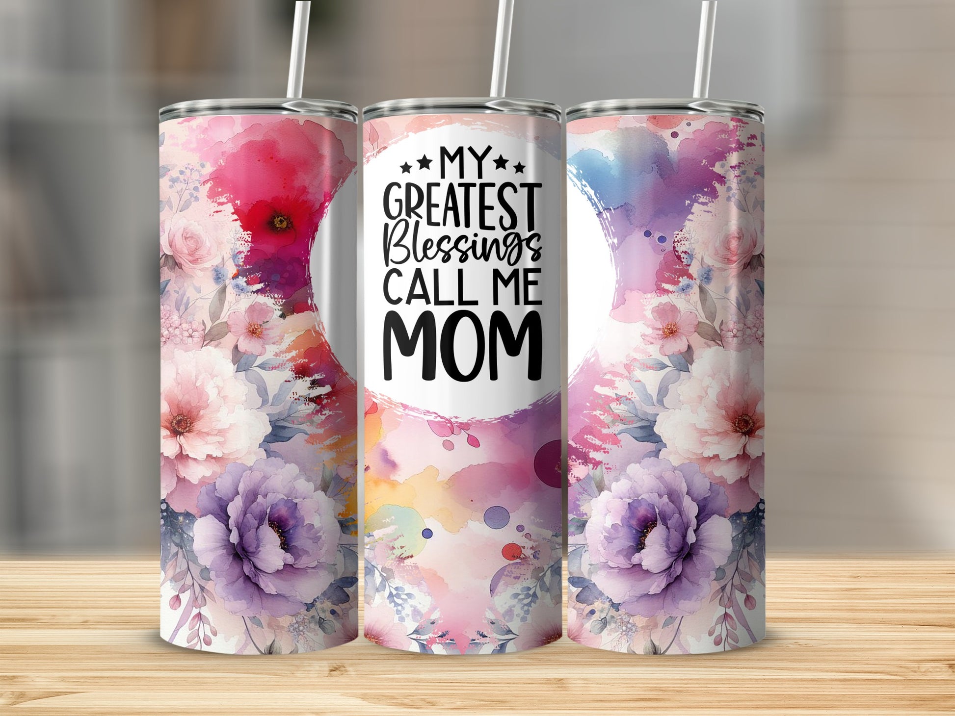 Tumbler with floral watercolor design and "My Greatest Blessings Call Mom" text.