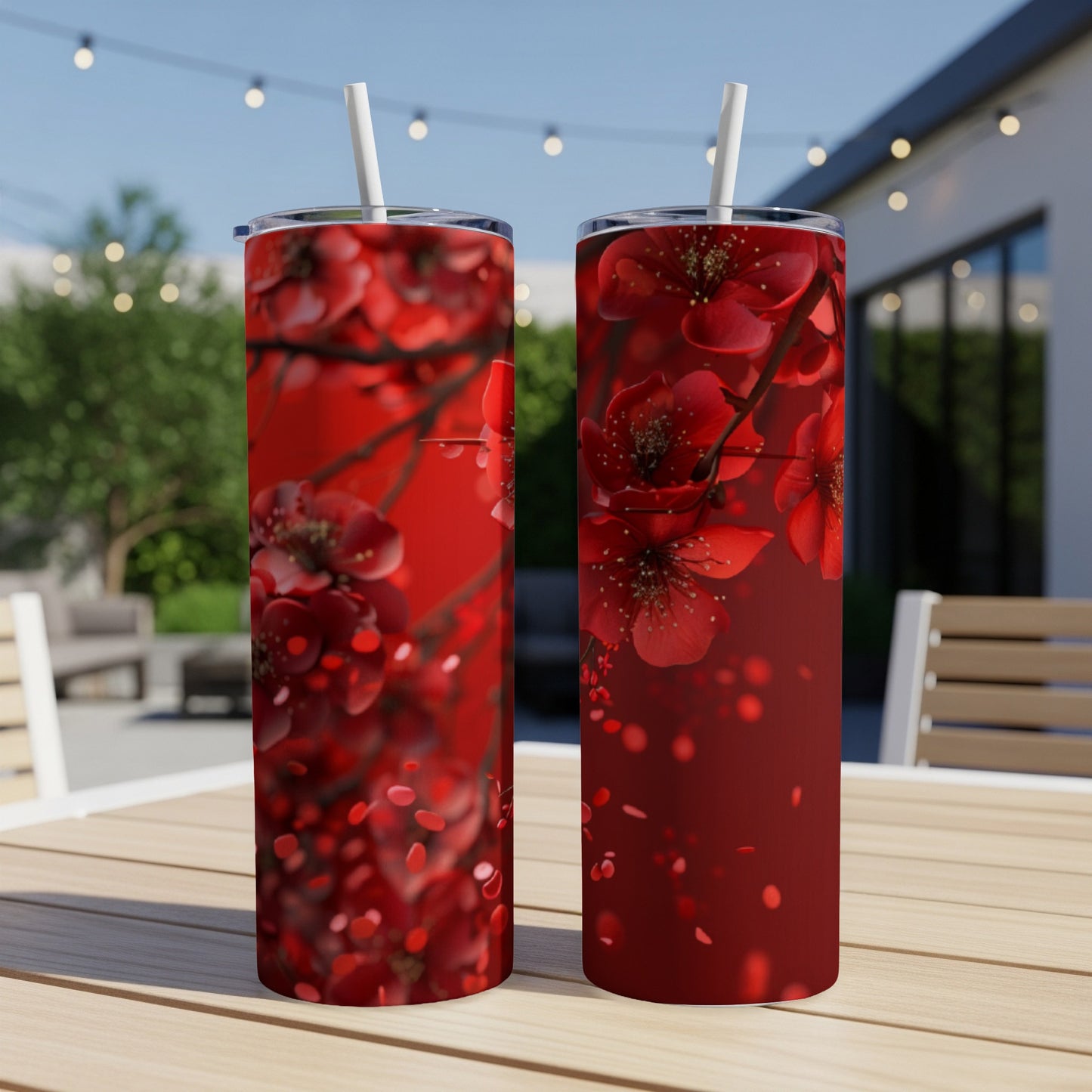 Two tumblers with red cherry blossoms and falling petals pattern.
