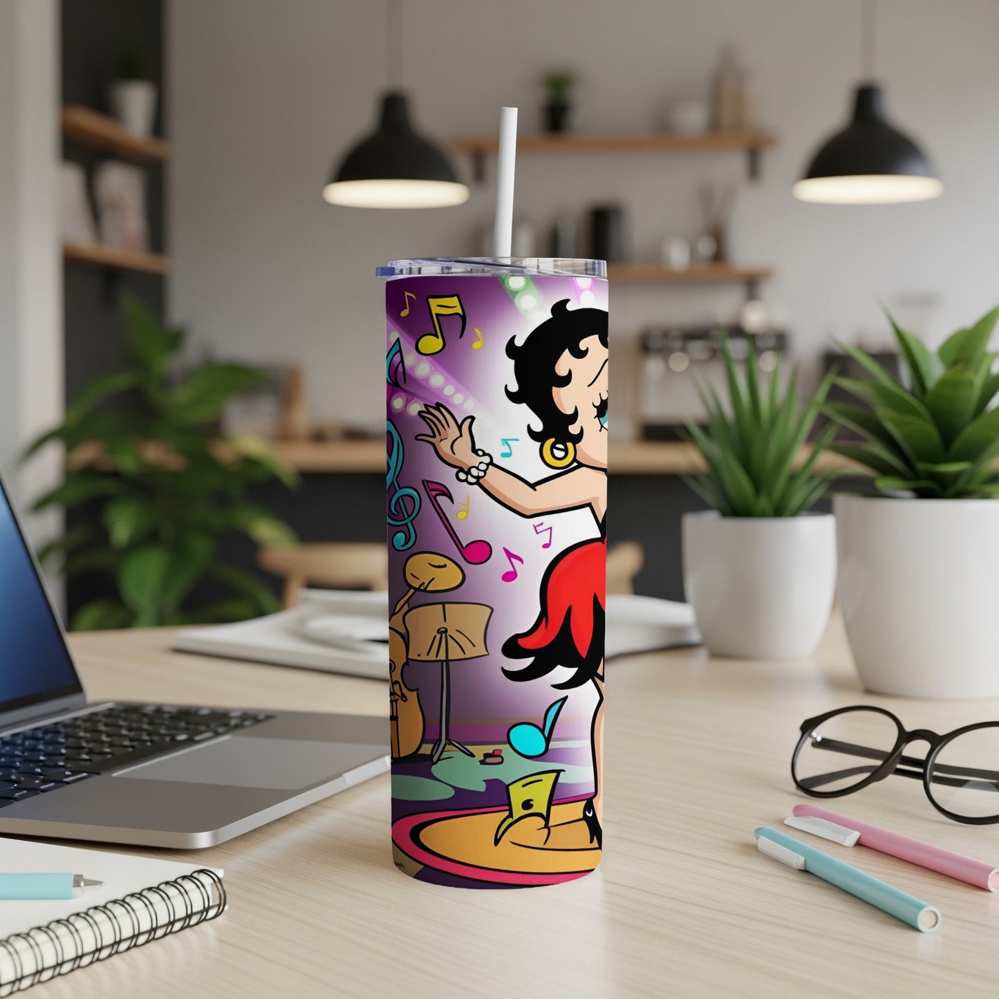 Betty Boop dancing with musical notes and instruments on a colorful stage.