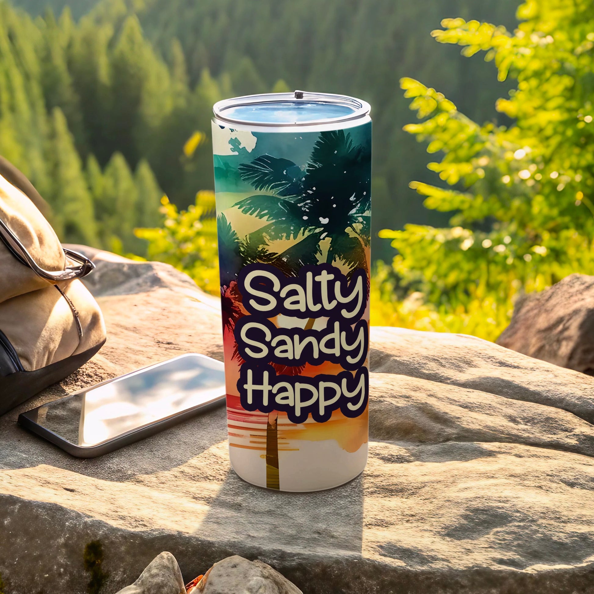 Salty Sandy Happy tumbler with palm trees and sunset design.