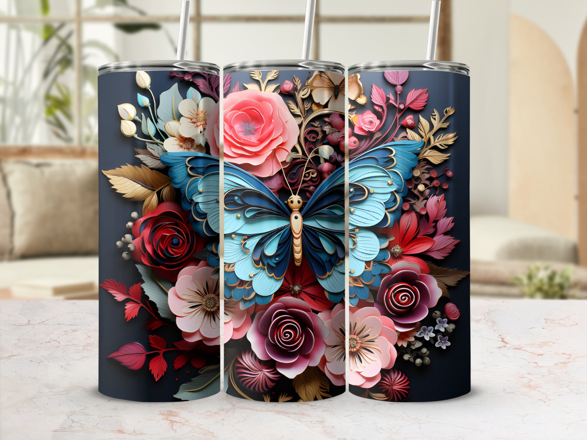 Triptych of tumblers featuring a blue butterfly and colorful floral designs.