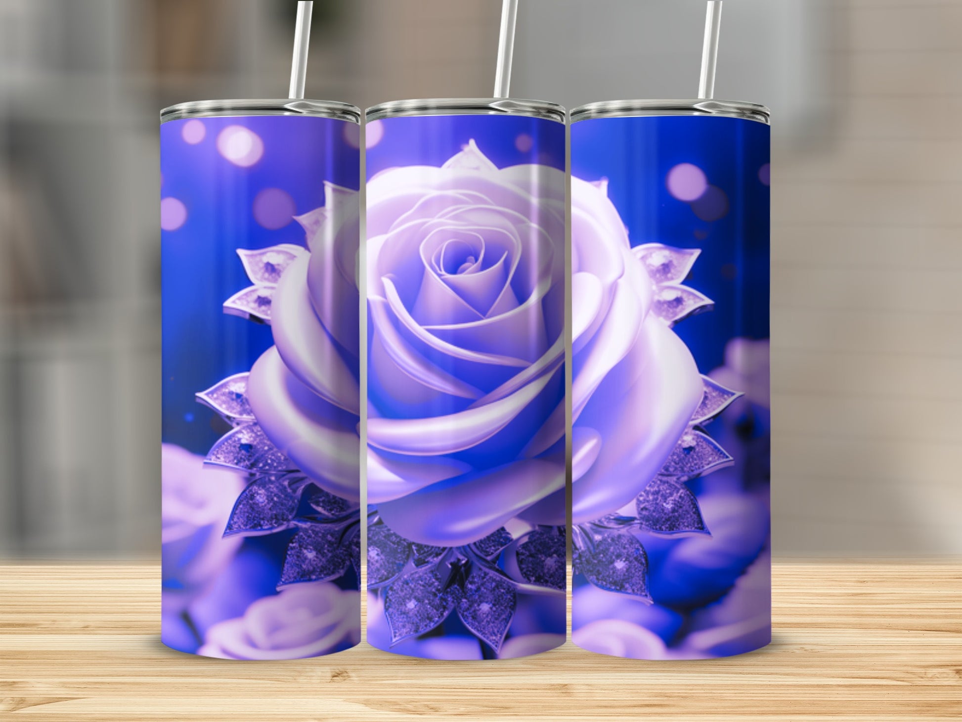 Three purple rose tumblers with glittery accents on a wooden surface.
