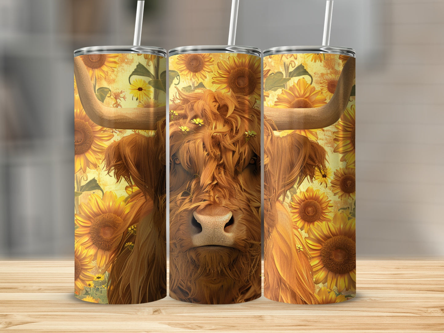 Three tumblers featuring a Highland cow surrounded by sunflowers.