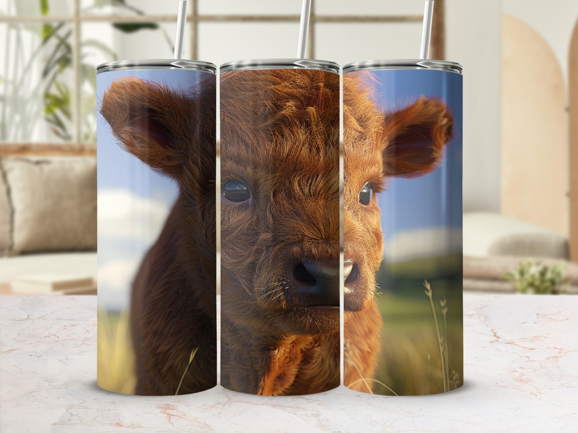 Three tumblers featuring a close-up of a fluffy brown calf's face.