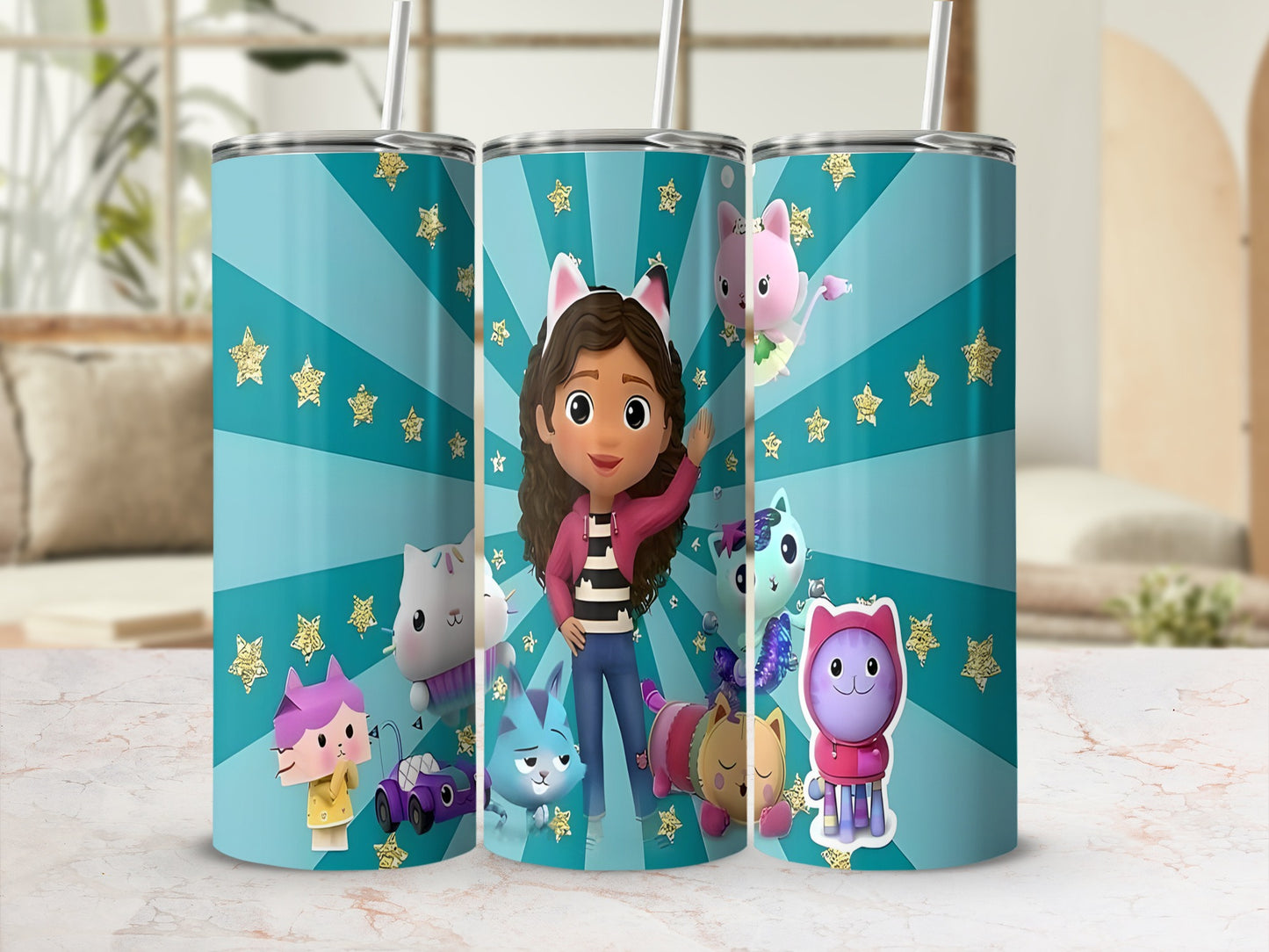 Gabby's Dollhouse tumbler with characters and golden stars on a teal background.