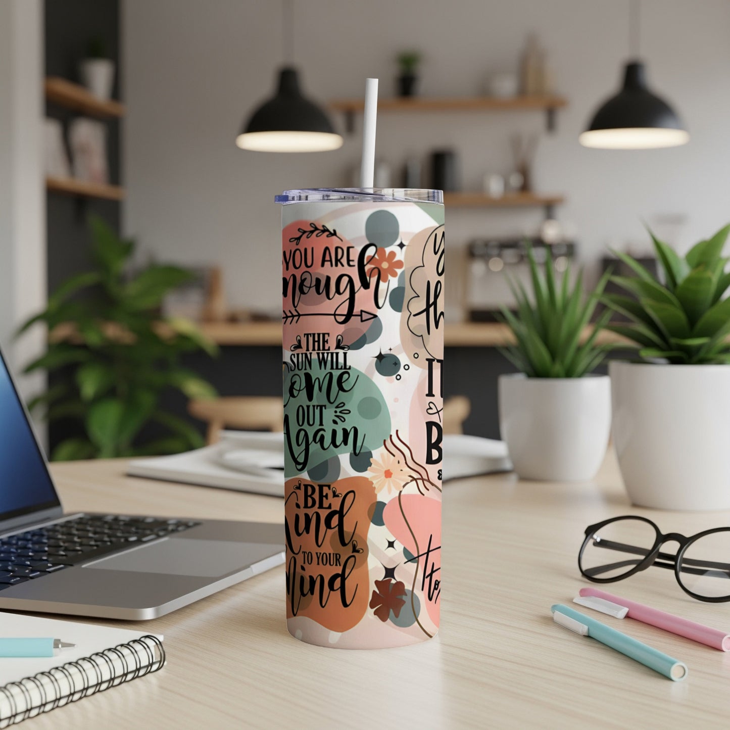 Tumbler with "You are enough" quote and floral pattern.