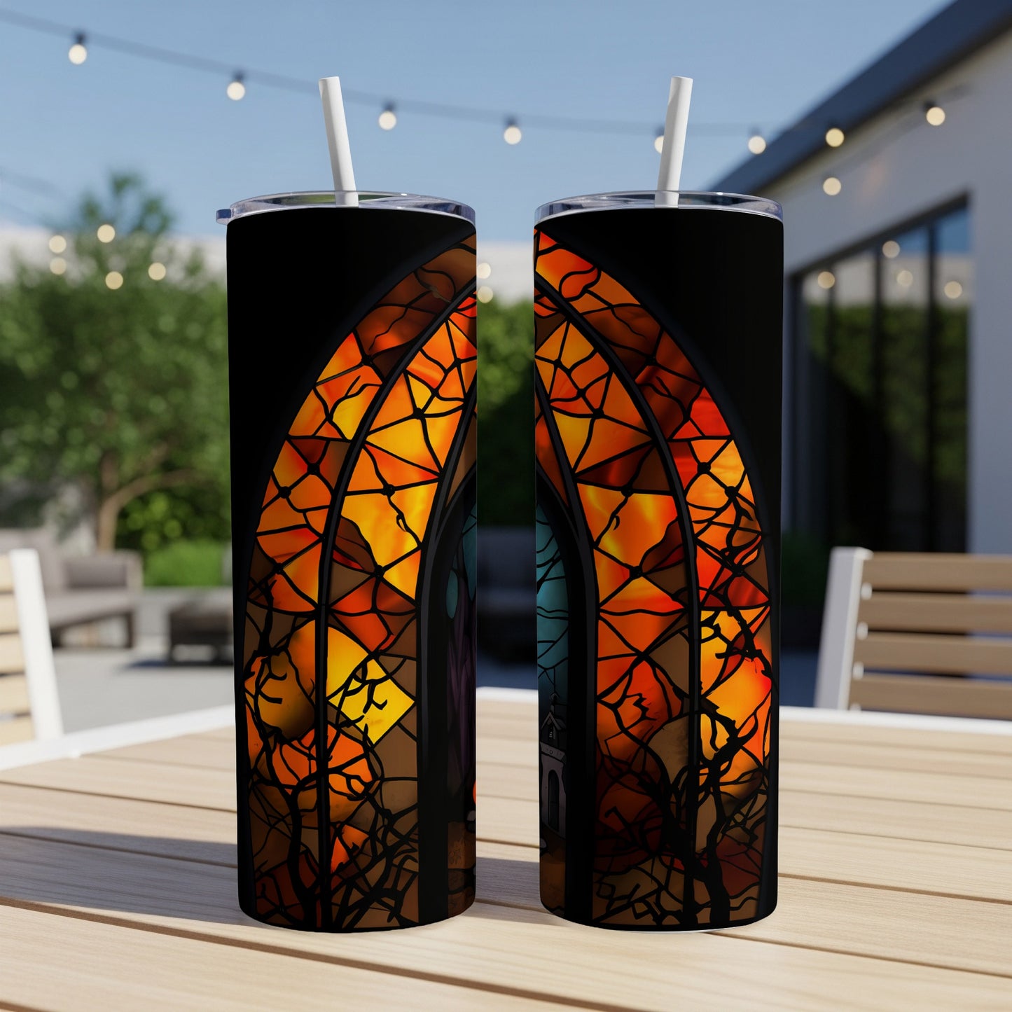 Two tumblers with stained glass window art, featuring gothic arches and warm colors.