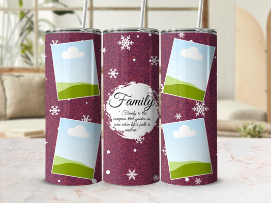 Tumbler with snow, photo frames, and "Family is the compass" quote.