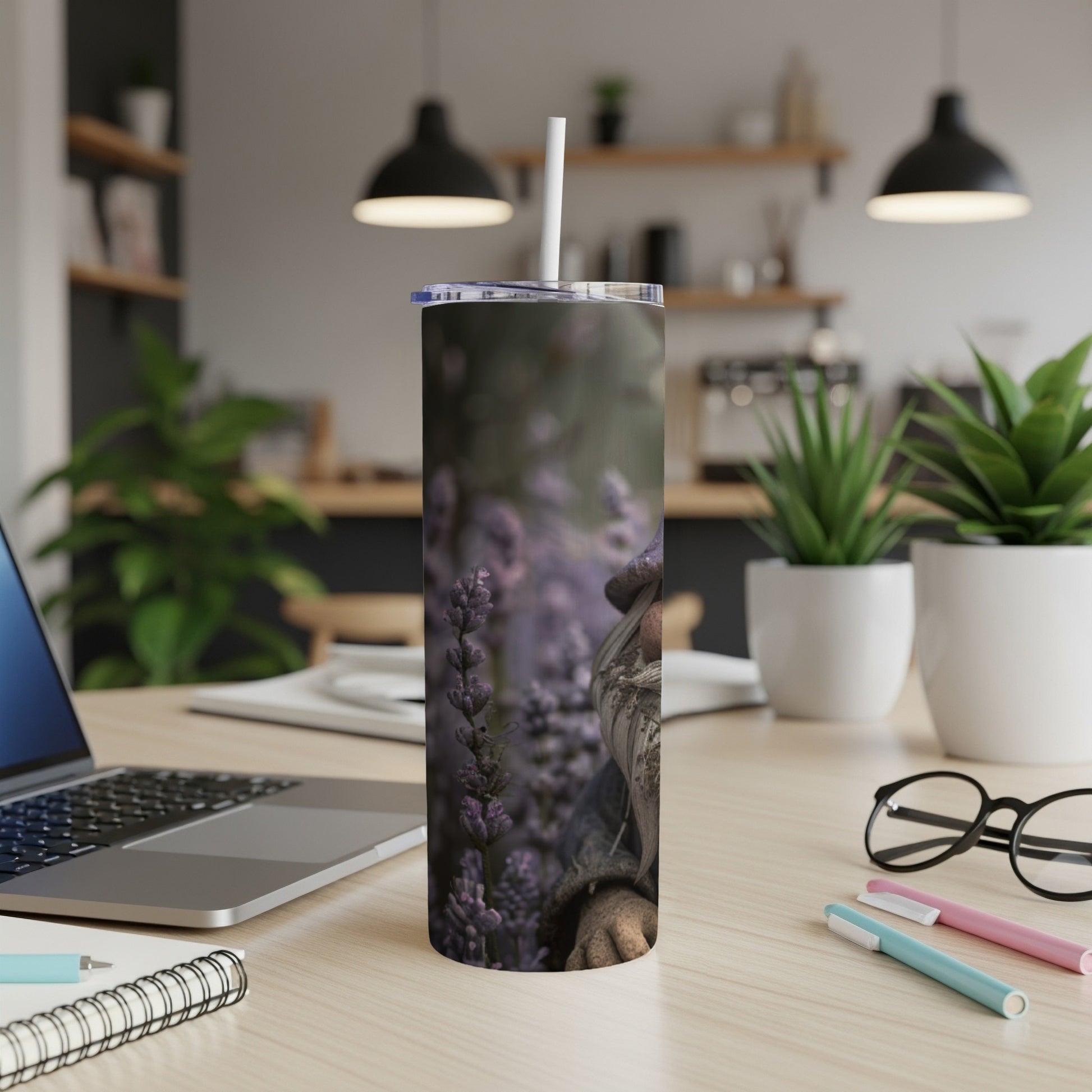 Gnome with lavender on a tall, slim tumbler with straw.