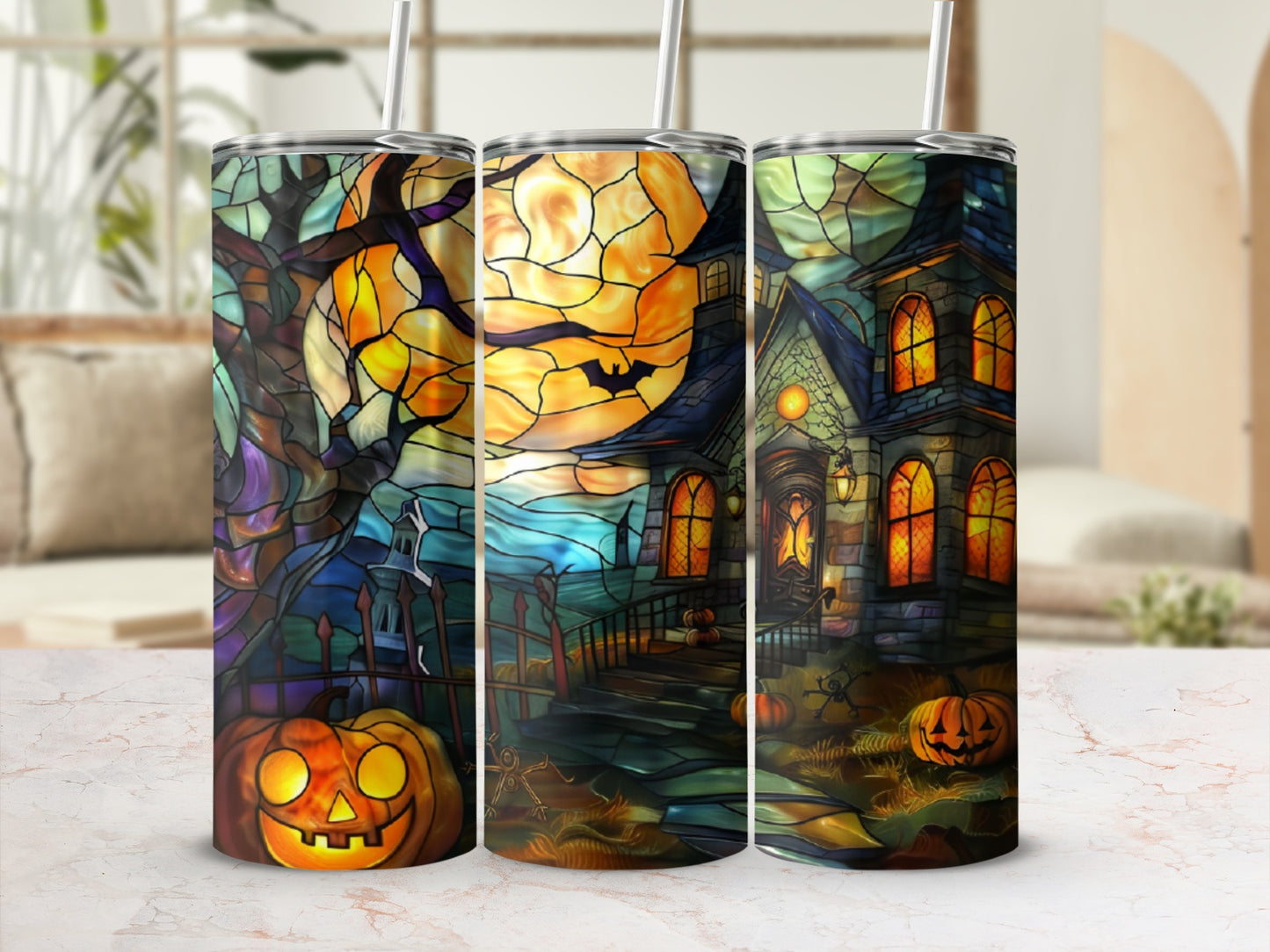 Stained glass tumbler with Halloween scene: haunted house, pumpkins, full moon.