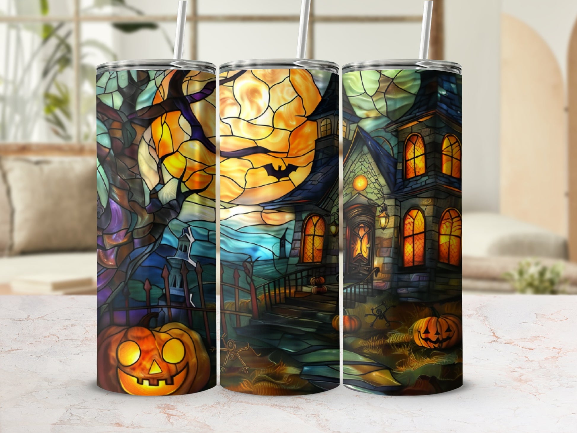 Stained glass tumbler with Halloween scene: haunted house, pumpkins, full moon.
