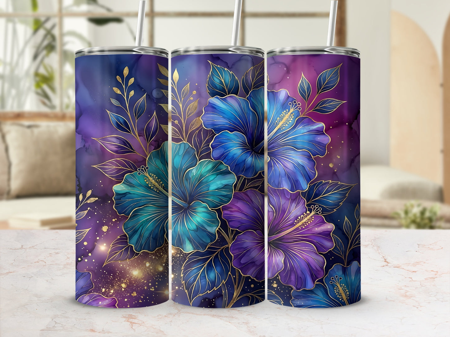 Three tumblers with purple and blue hibiscus flowers and gold accents.