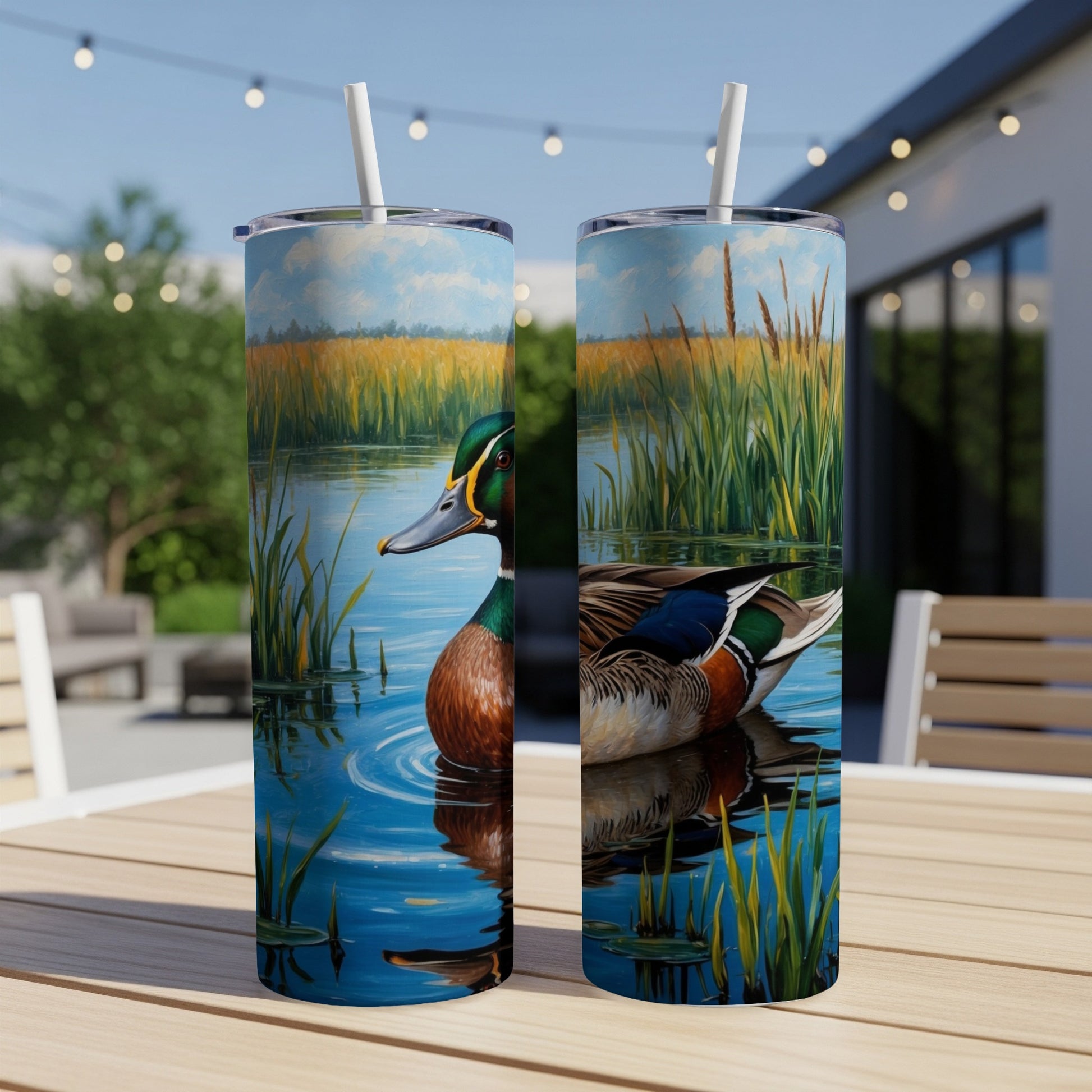 Mallard duck in water with reeds, realistic painting on a tumbler.