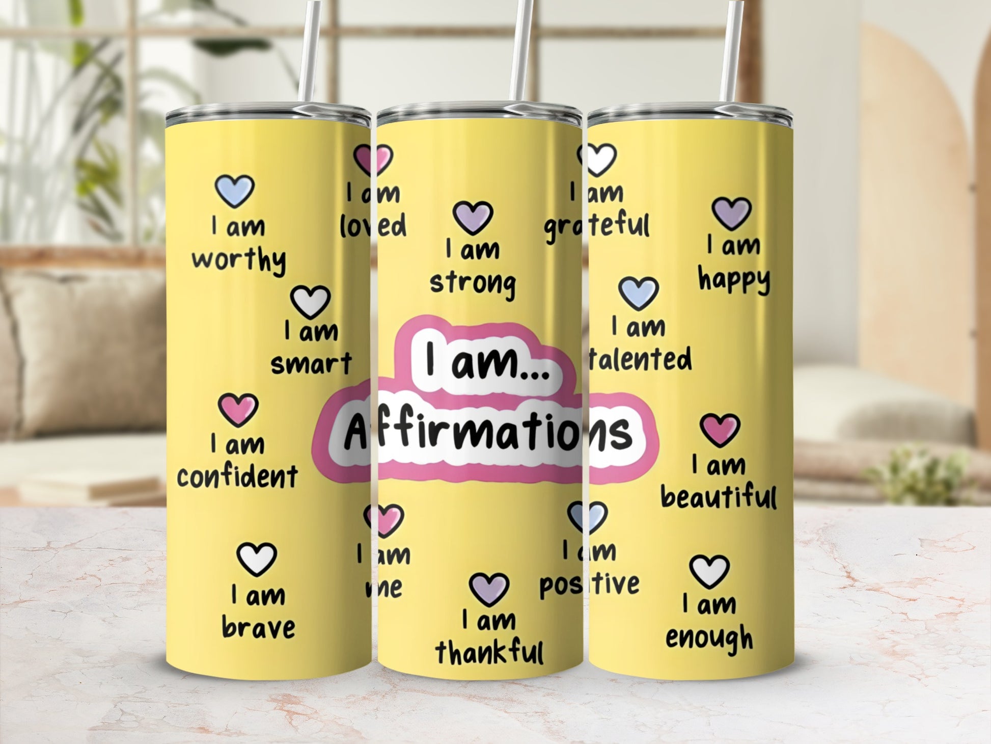 Yellow tumbler with "I am Affirmations" and heart shapes in pink and purple.