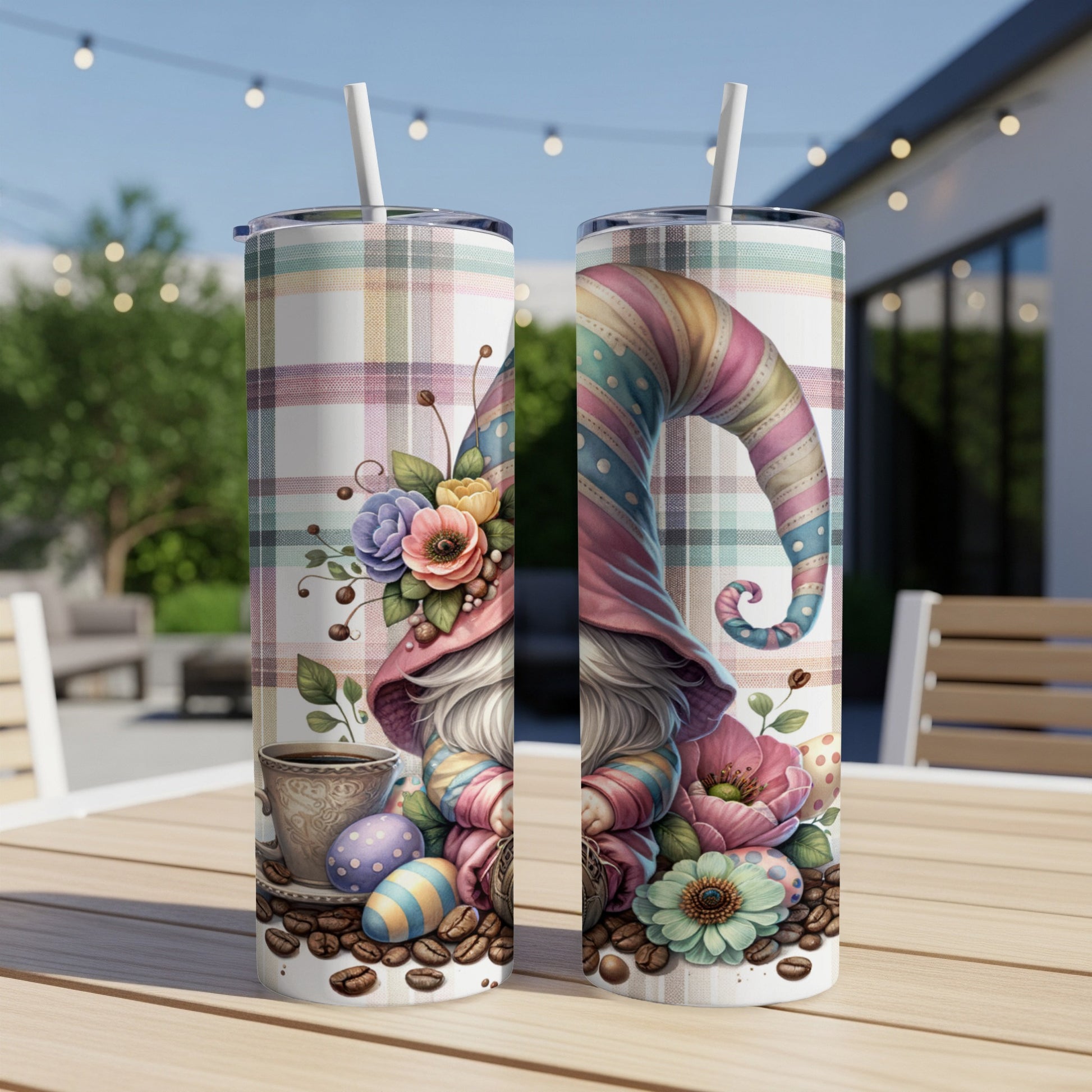 Two tumblers with a gnome, Easter eggs, and coffee, on a table.