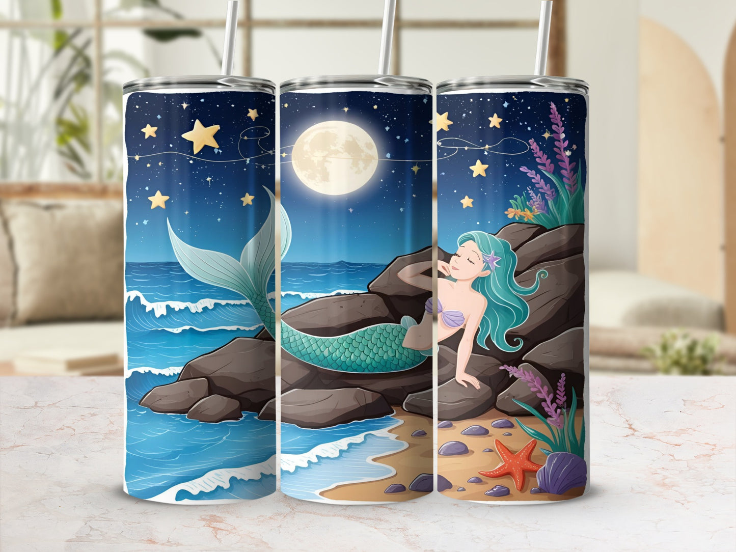 Tumbler with a mermaid on a rocky shore under a starry night sky.