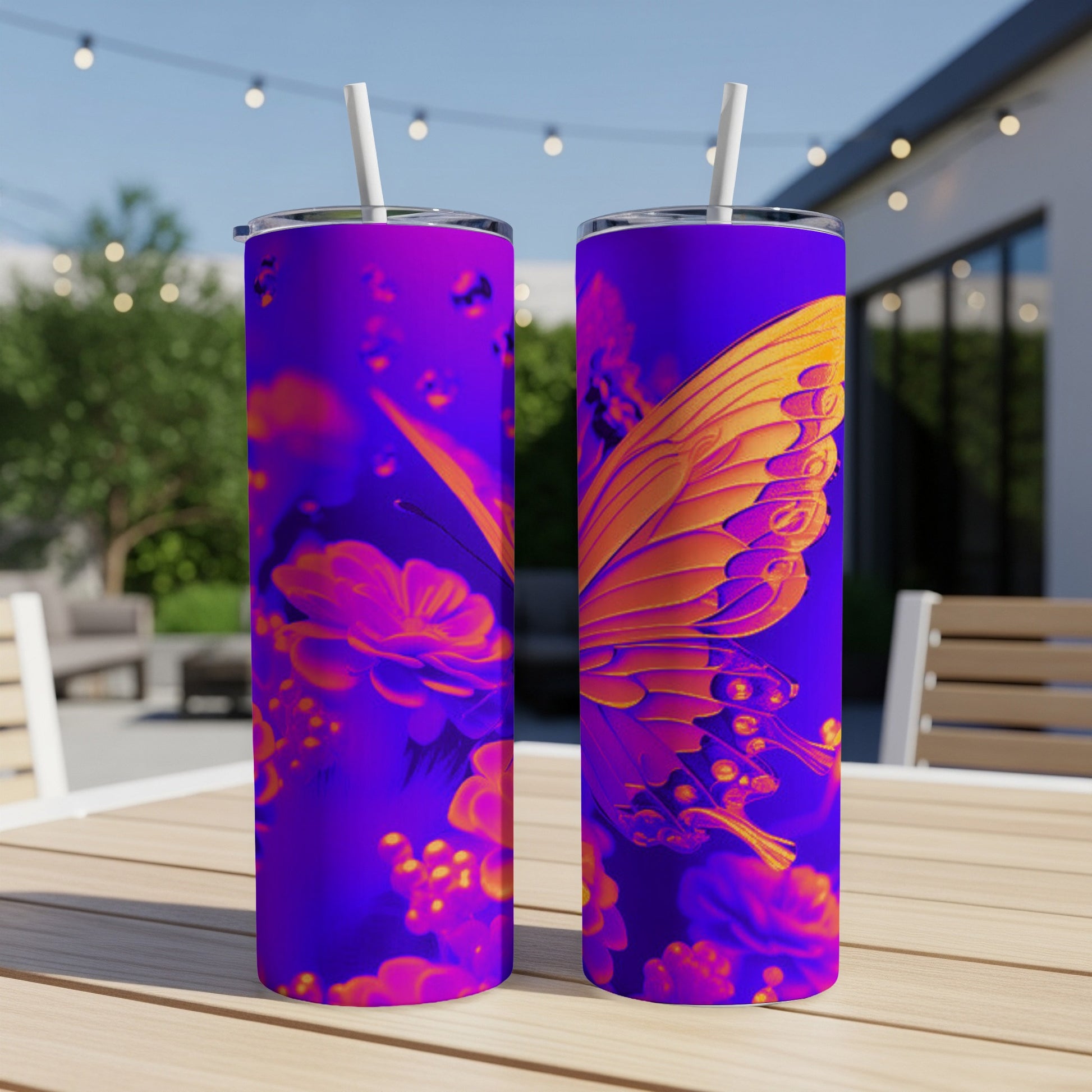 Two purple tumblers with a vibrant butterfly and floral design.