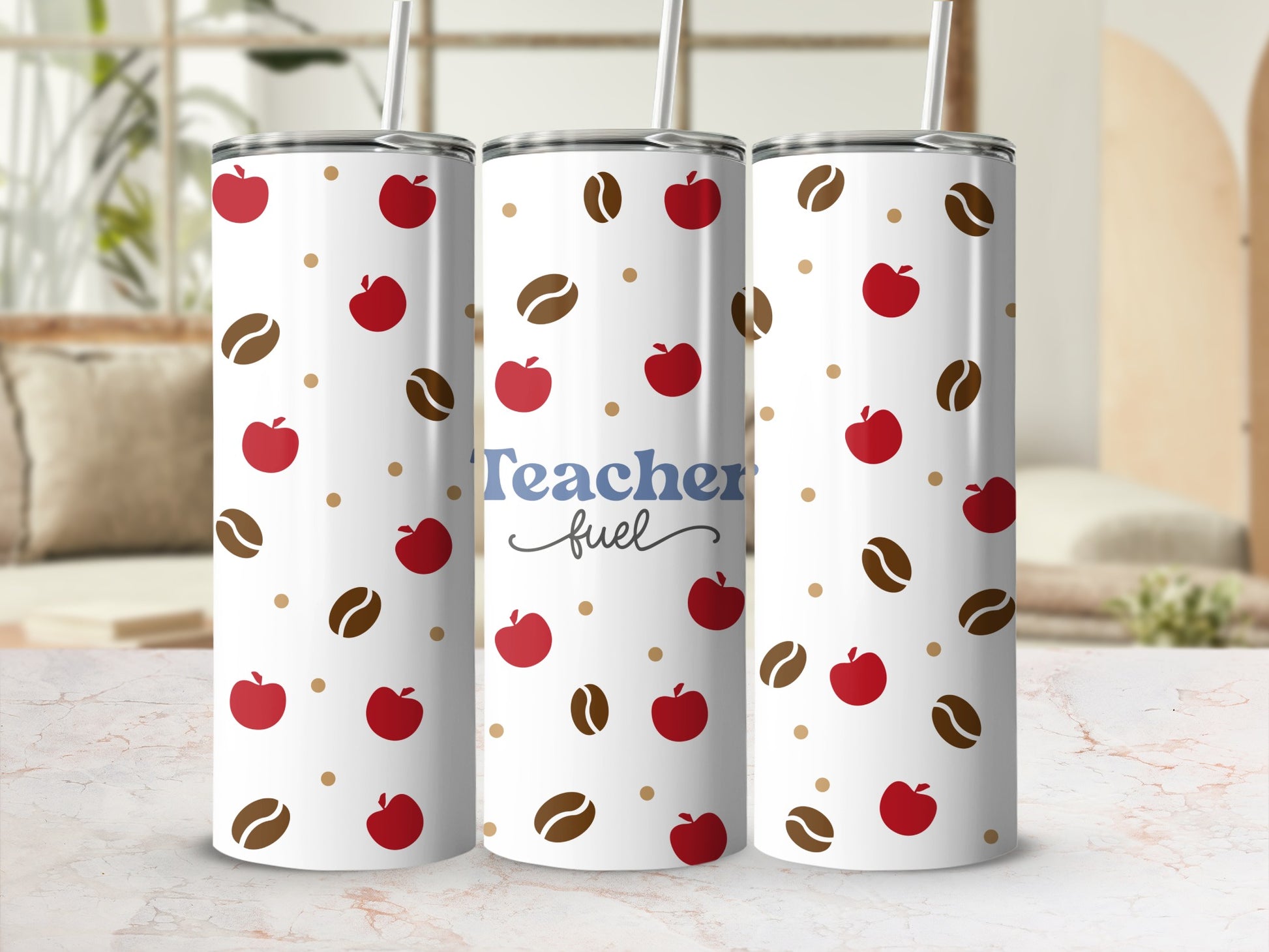 Tumbler with apples, coffee beans, and "Teacher fuel" text.
