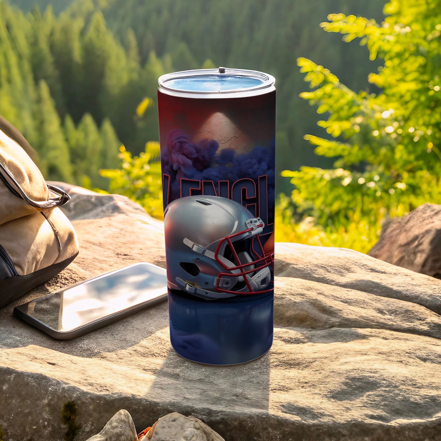 Patriots helmet and logo on a travel tumbler outdoors.