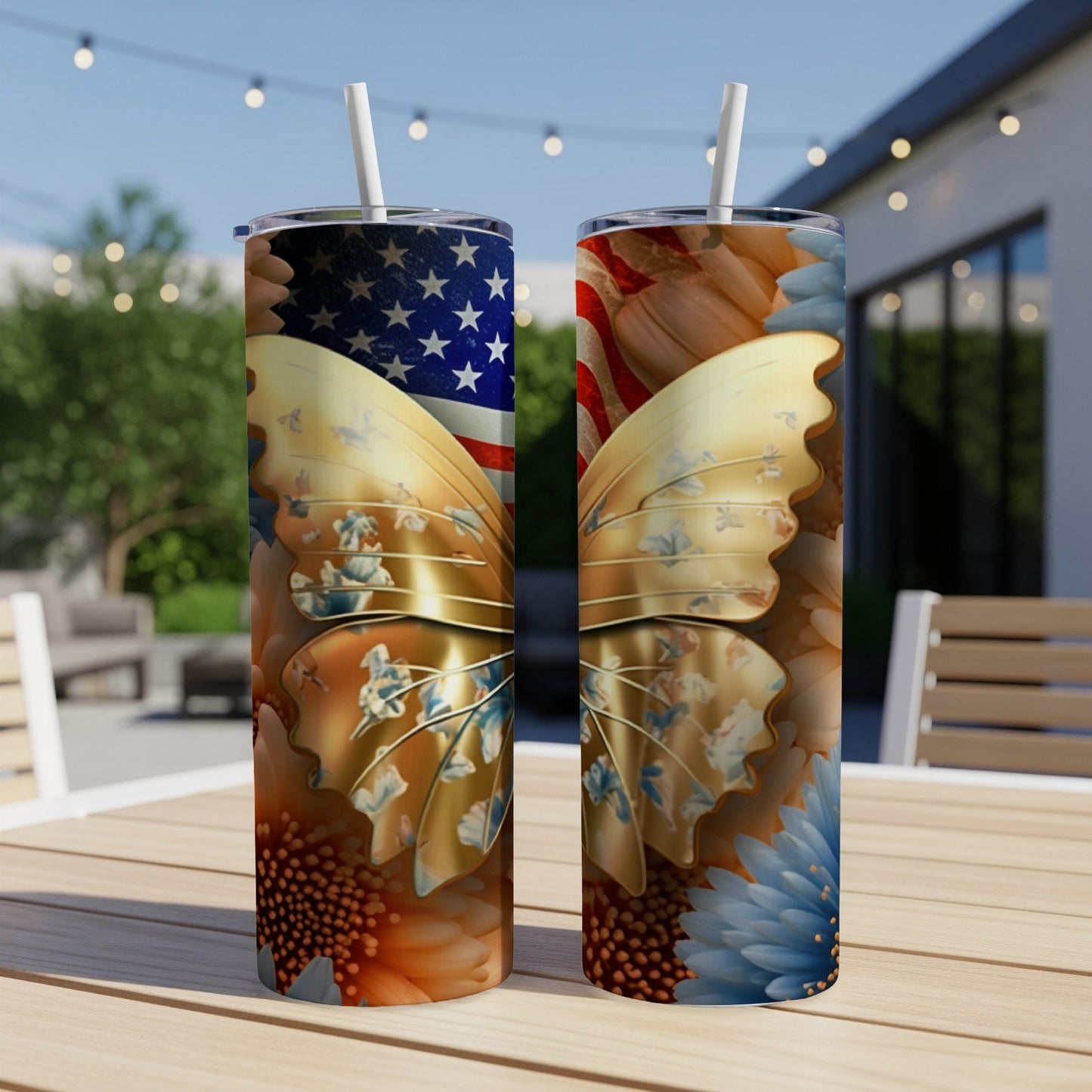 Two tumblers with American flag and butterfly designs sit on a table outdoors.