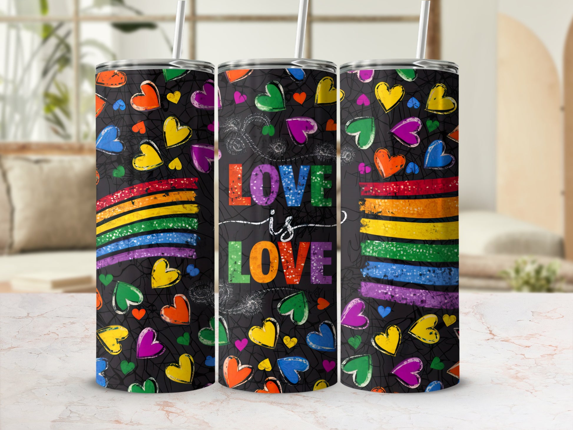Tumbler with rainbow hearts and "Love is Love" text.