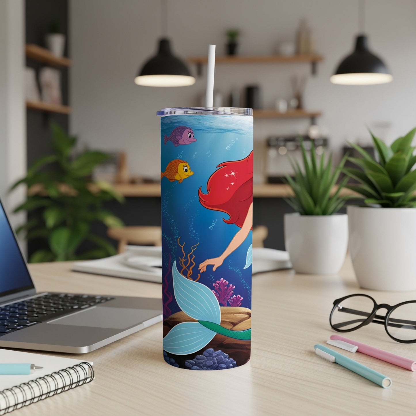 The Little Mermaid tumbler features Ariel, Flounder, and Sebastian underwater.